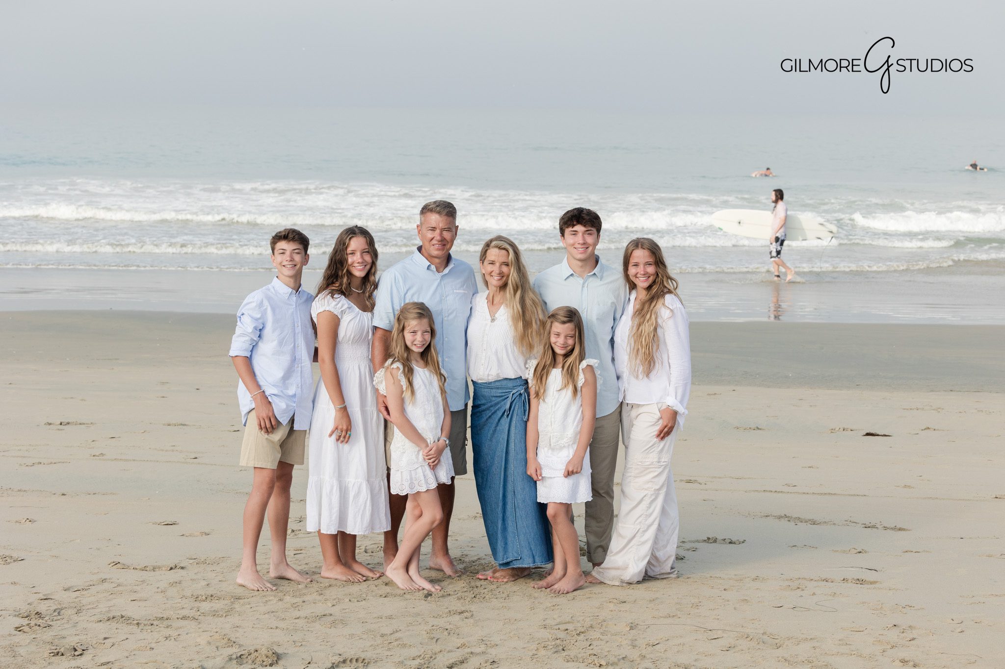 Professional extended family photography captured with soft coastal light

Newport Pier extended family portrait photography with neutral styling