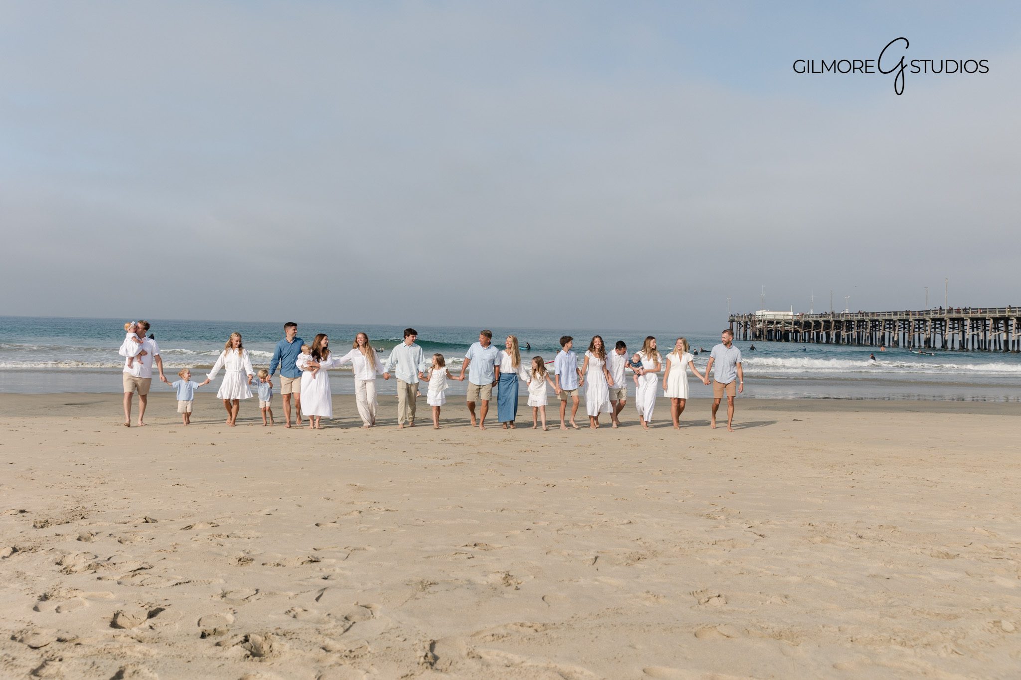 Professional family photographer documenting a Newport Pier extended family session

Coastal extended family photography captured at Newport Beach Pier