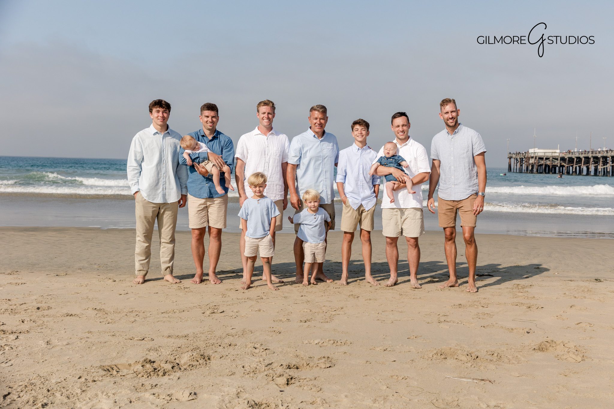 Newport Pier family photos showcasing grandparents parents and children

Professional family photography session for an extended family at the pier