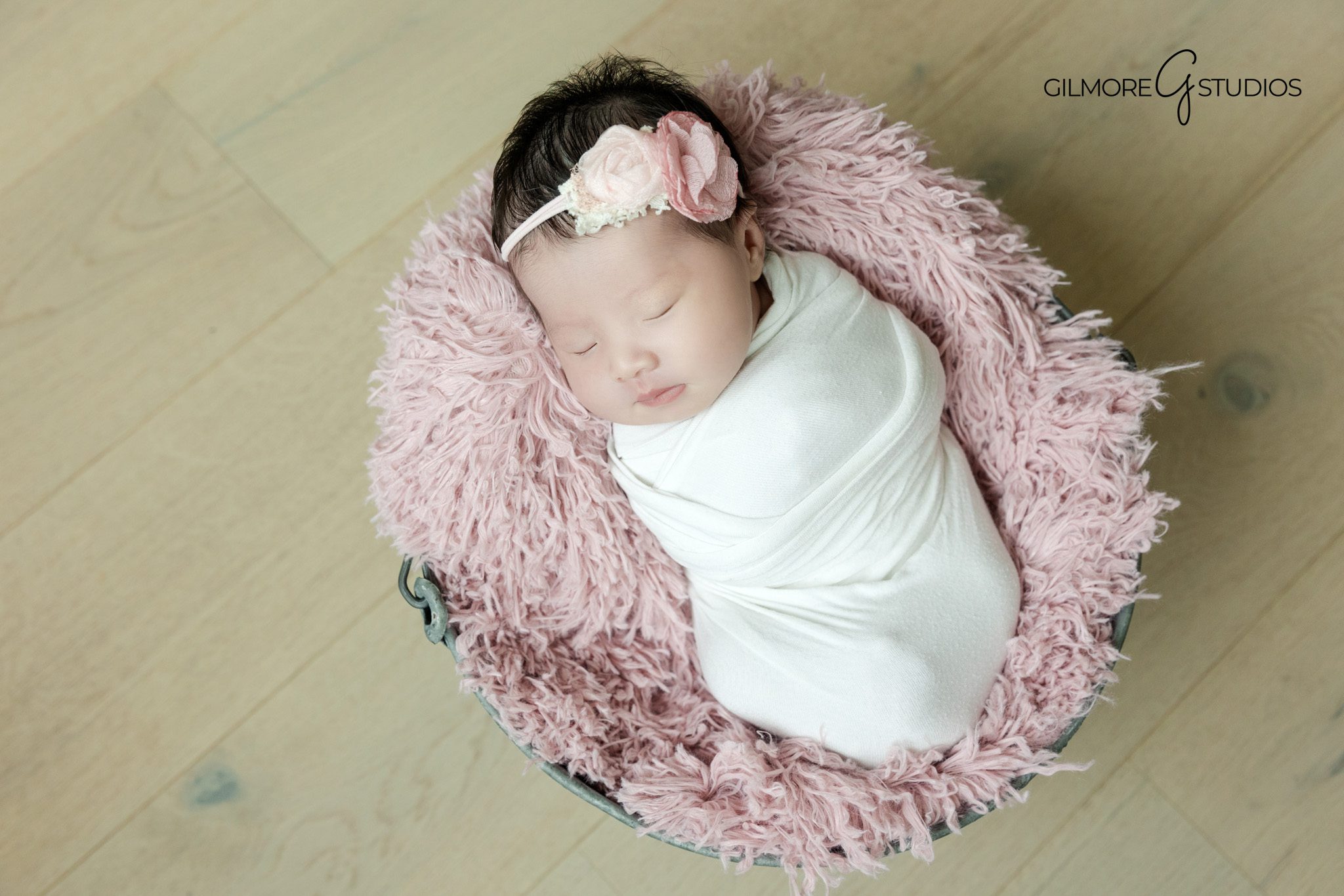 Newborn baby captured in a quiet moment

Simple newborn photography style