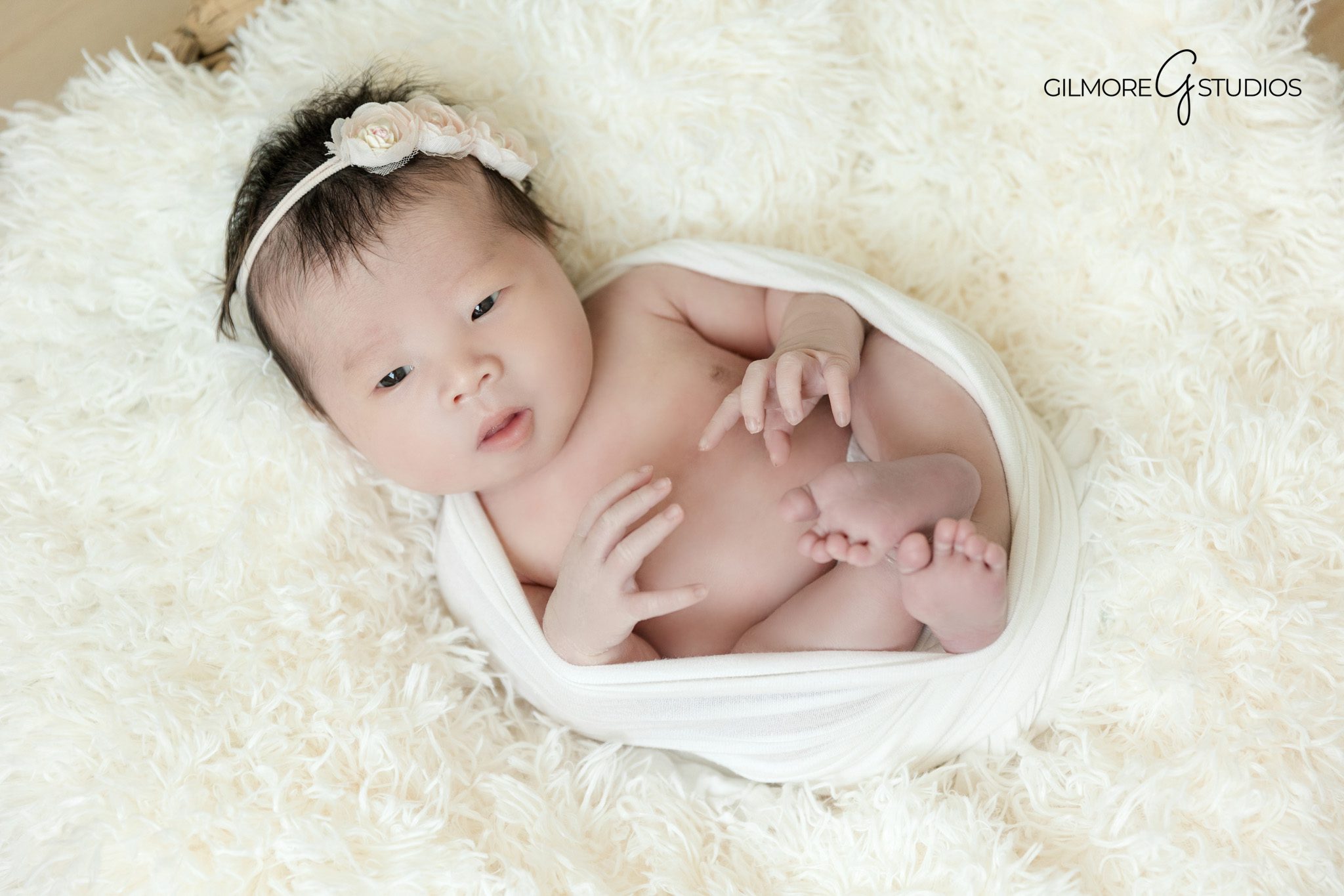 Newborn baby resting calmly

Newborn portrait focused on simplicity