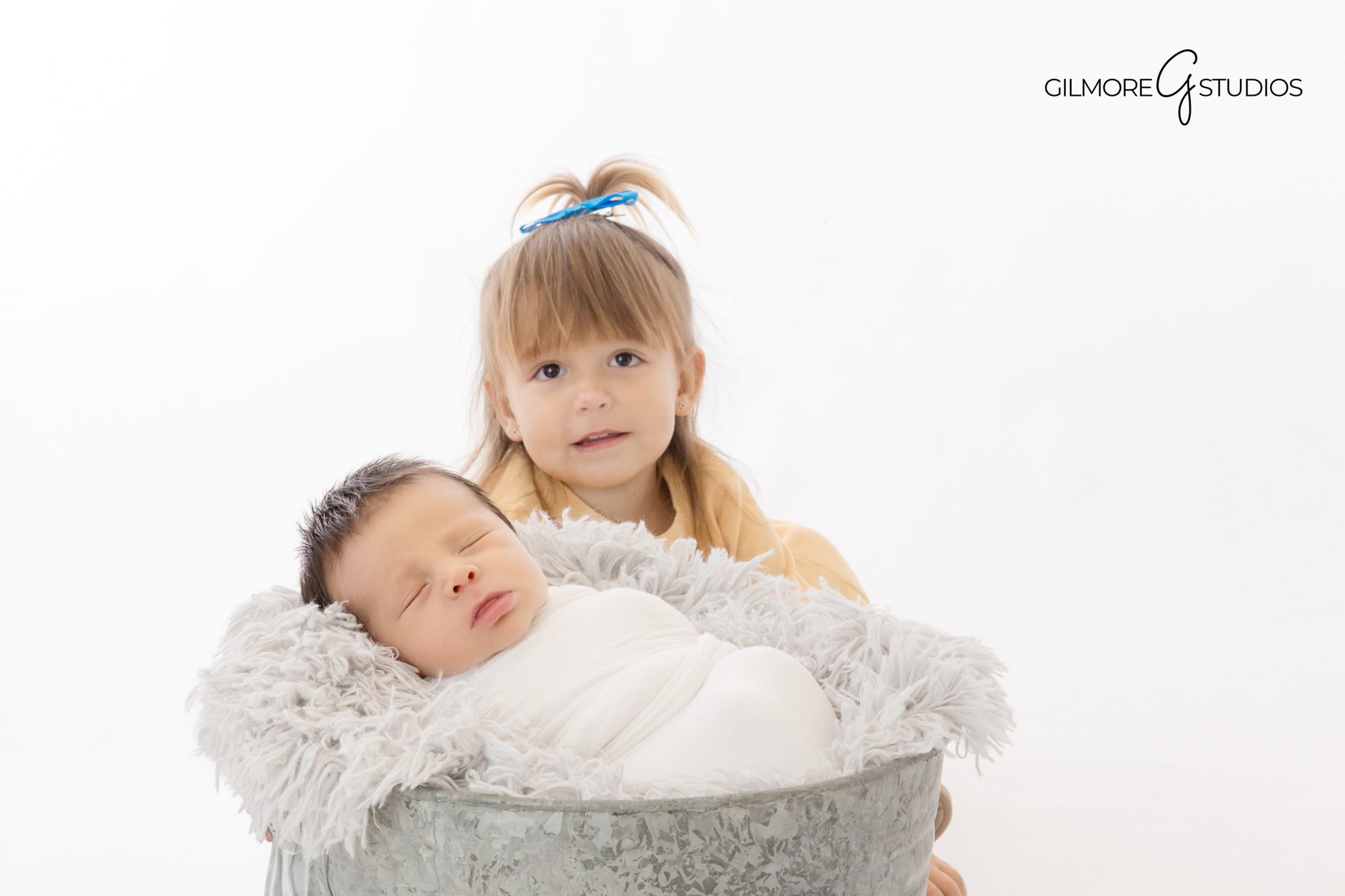 Newborn baby photographed gently with winter accents
Peaceful newborn photography during winter