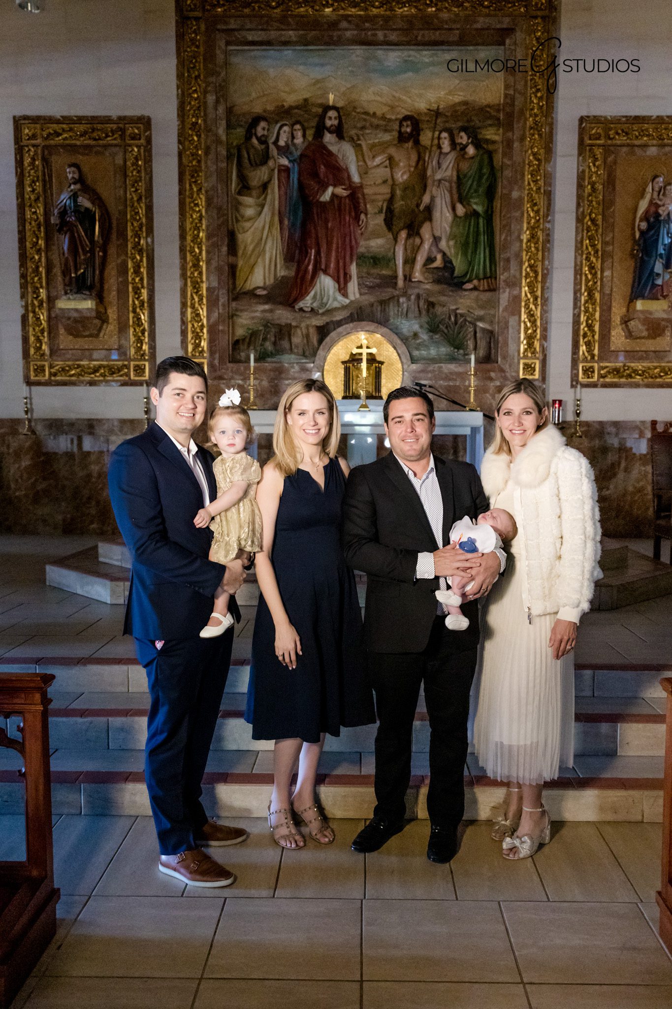 Catholic baptism ceremony photographed with reverence and care

Newport Beach baptism photography featuring parents and godparents