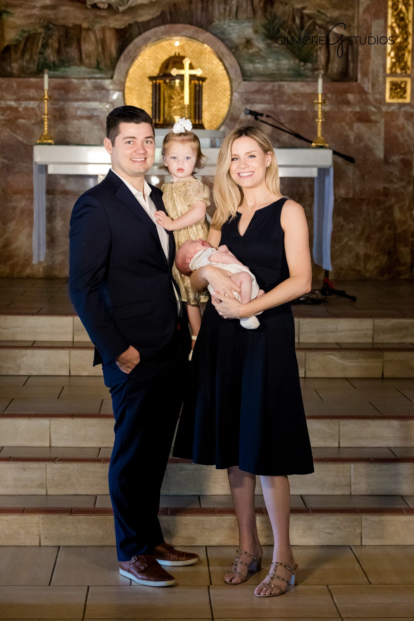 Baptism photography session photographed by a Catholic baptism photographer

Catholic baptism portrait photography with timeless church lighting