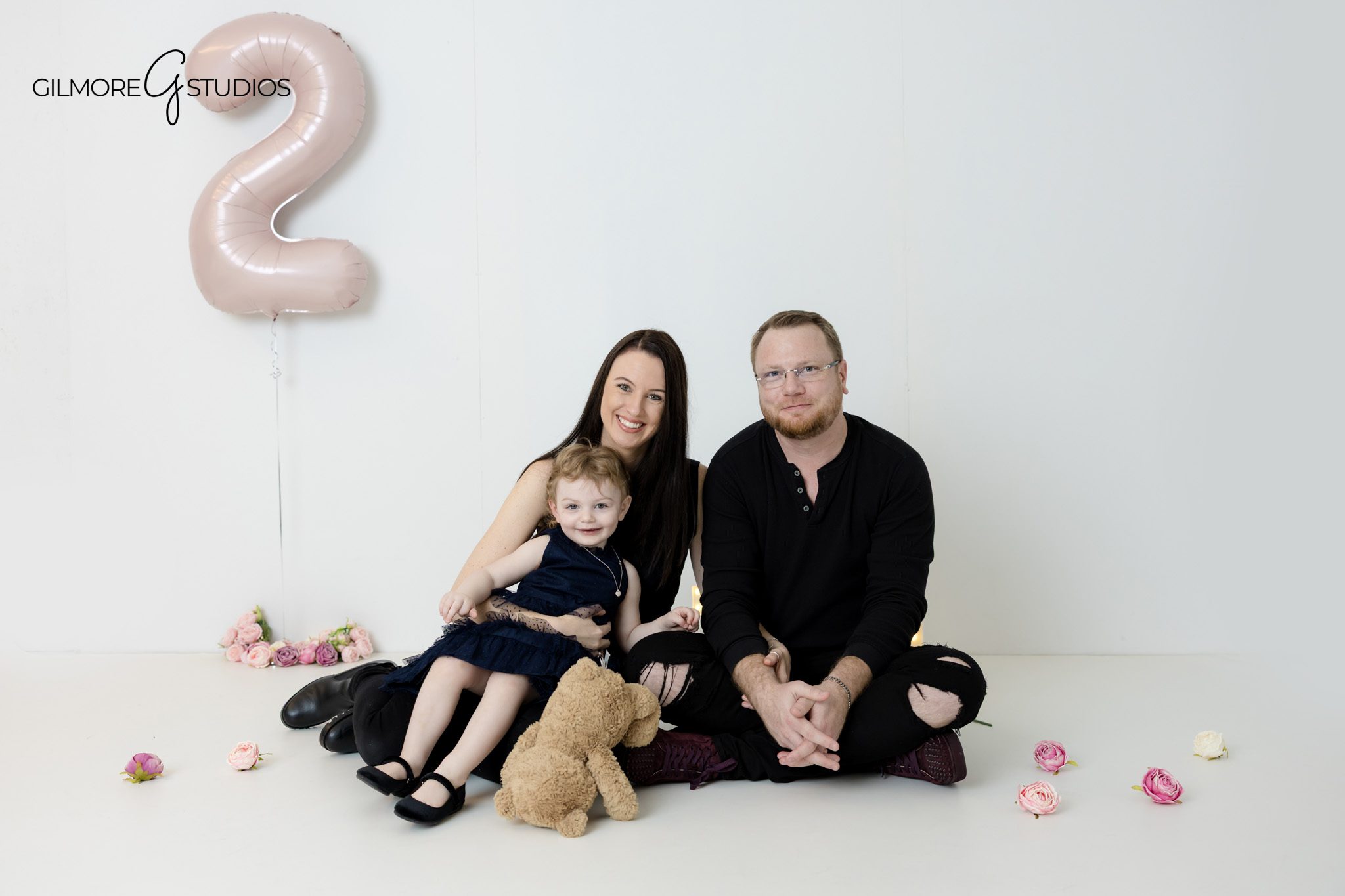 Family enjoying time together during a session
Relaxed family photo with genuine connection