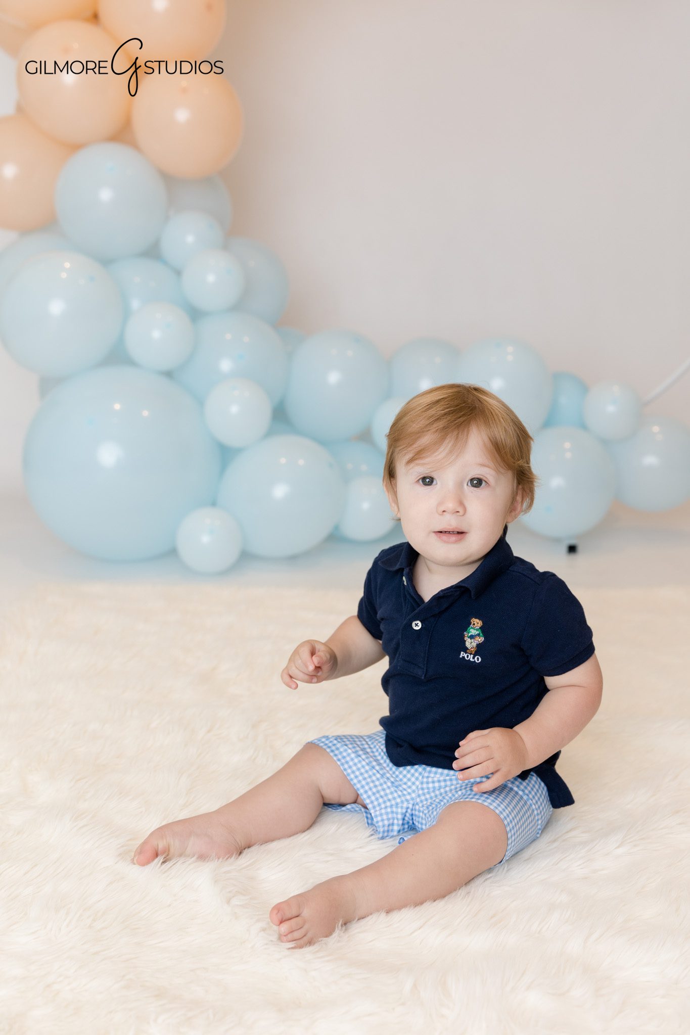 First birthday cake smash photography with coastal colors Orange County
Baby birthday milestone portraits with beach inspired decor Orange County