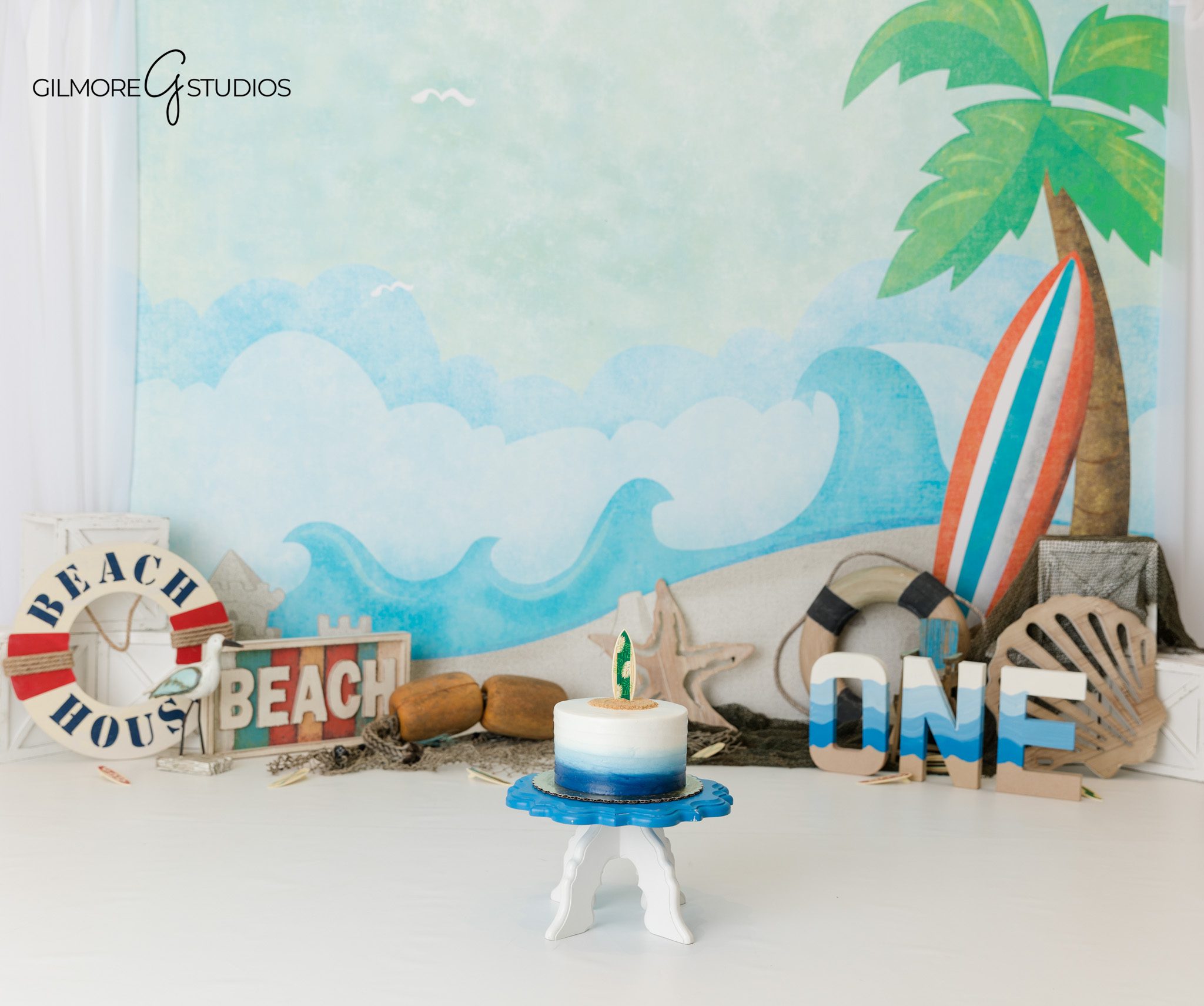 First birthday baby milestone portraits with coastal decor Orange County
Baby birthday photography with beach inspired setup Orange County studio