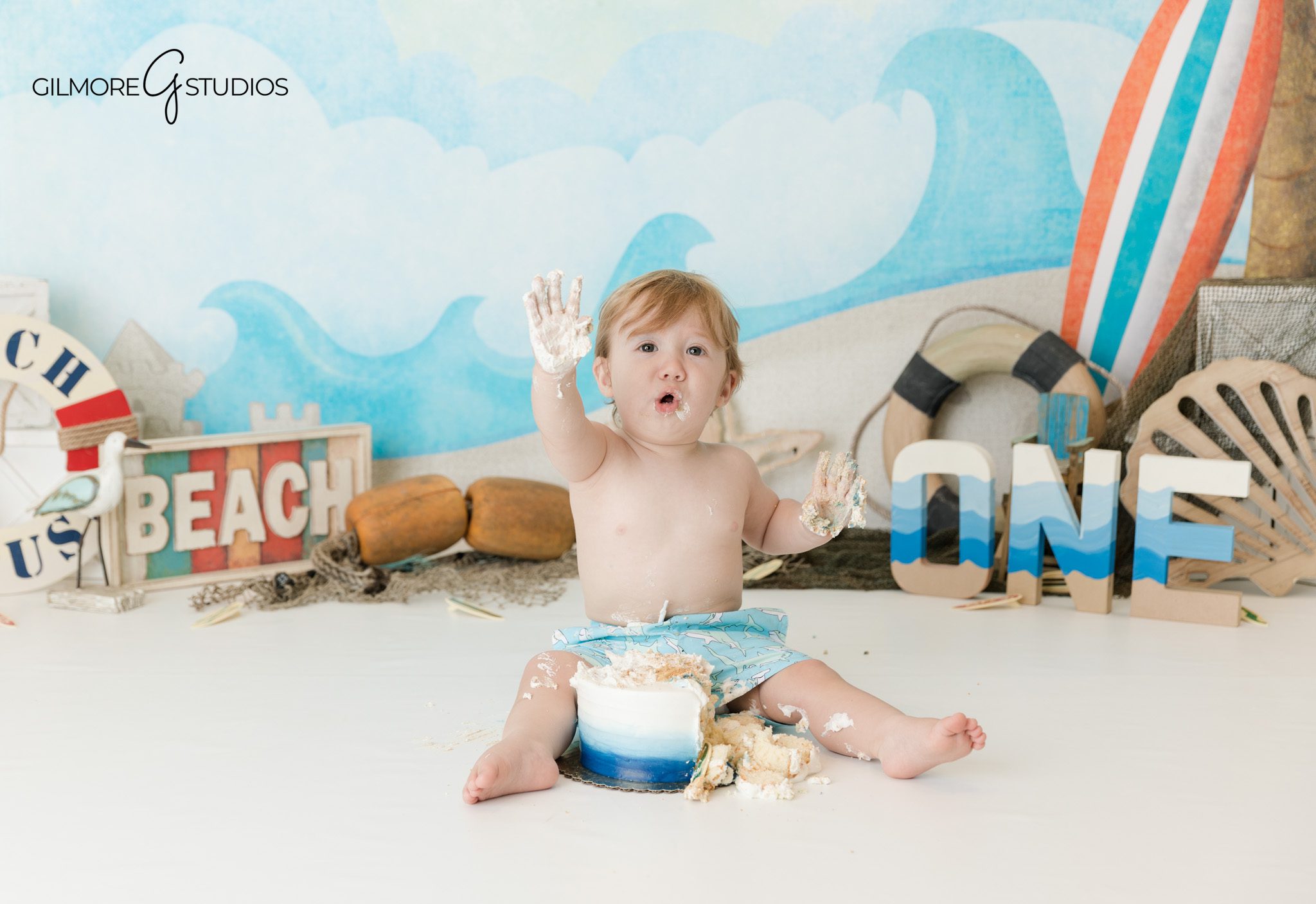 Indoor coastal cake smash photography session Orange County CA
First birthday baby milestone portraits beach inspired Orange County