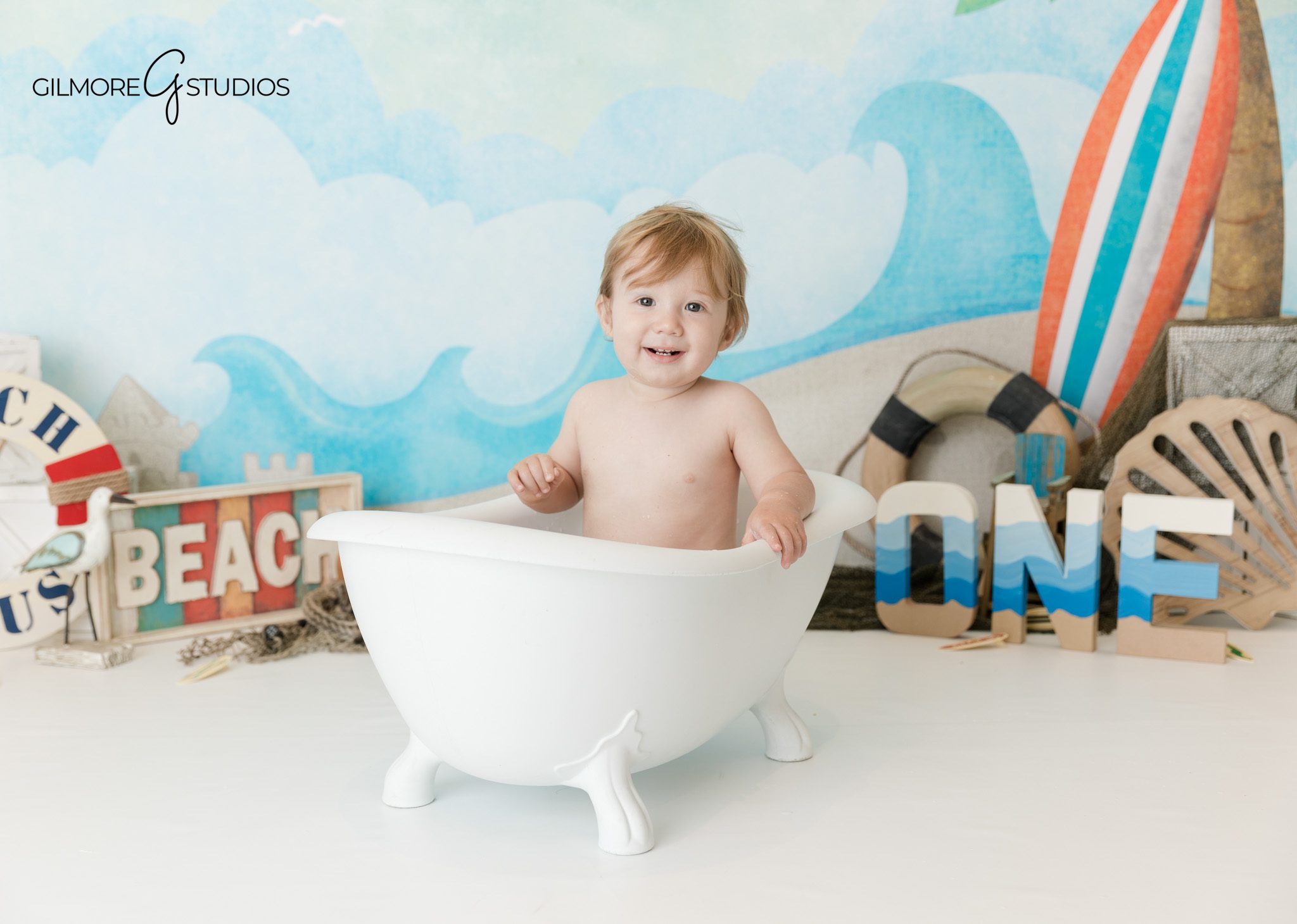Baby cake smash coastal inspired photography Orange County
First birthday milestone portraits with seashell decor Orange County