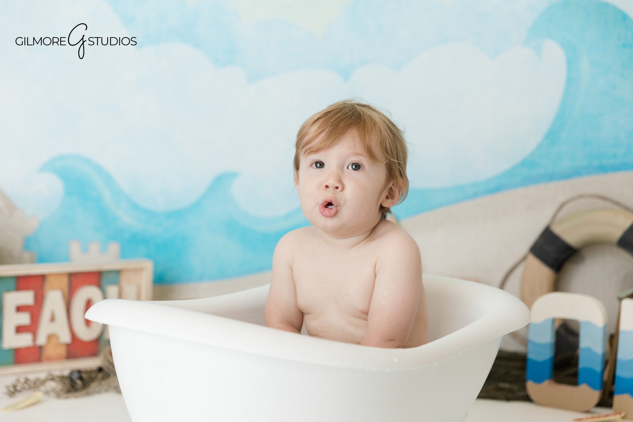 First birthday photography capturing baby milestone with beach theme decor Orange County
Baby birthday portrait photography ocean theme in Orange County