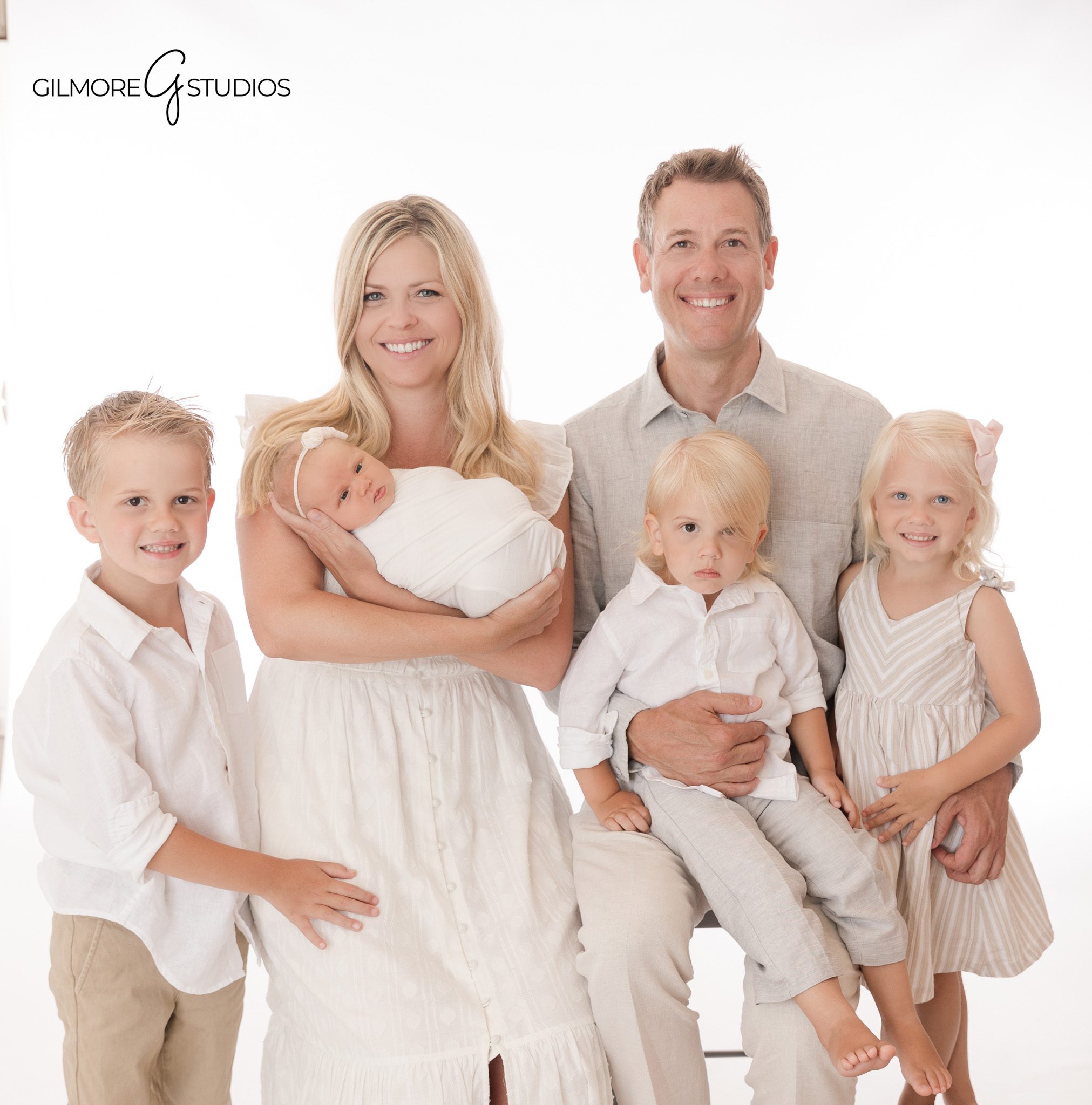 Queen Creek maternity photography portrait of expecting mother in soft natural light

Newborn photography portrait in Queen Creek studio with baby wrapped in neutral tones