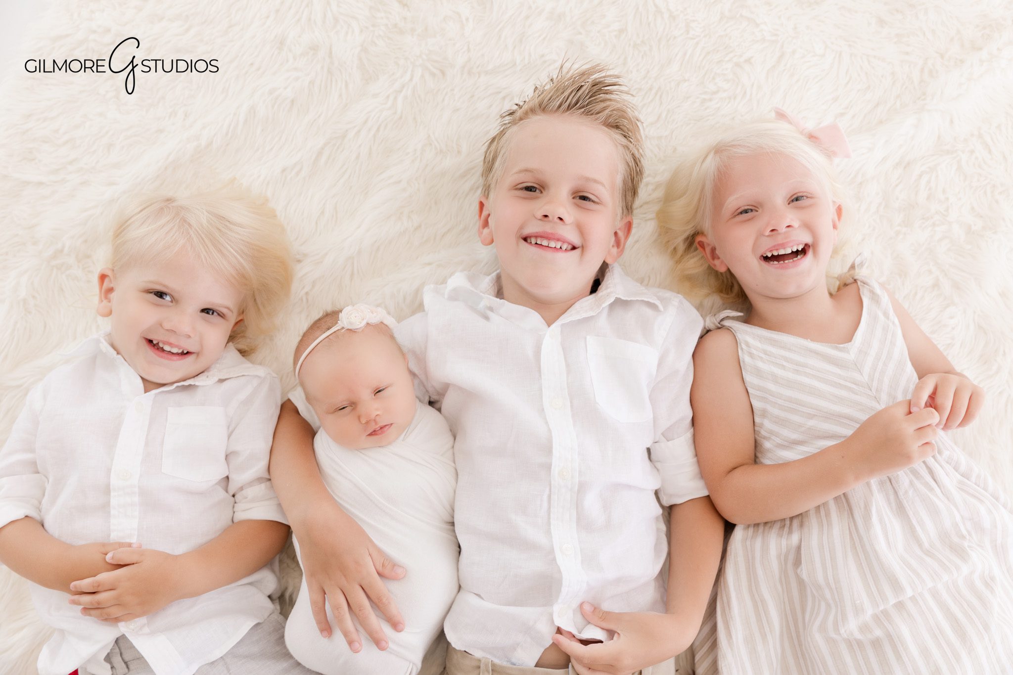 Newborn photographer Queen Creek posing baby in cozy studio setup

Child portrait photography in Queen Creek with natural expressions