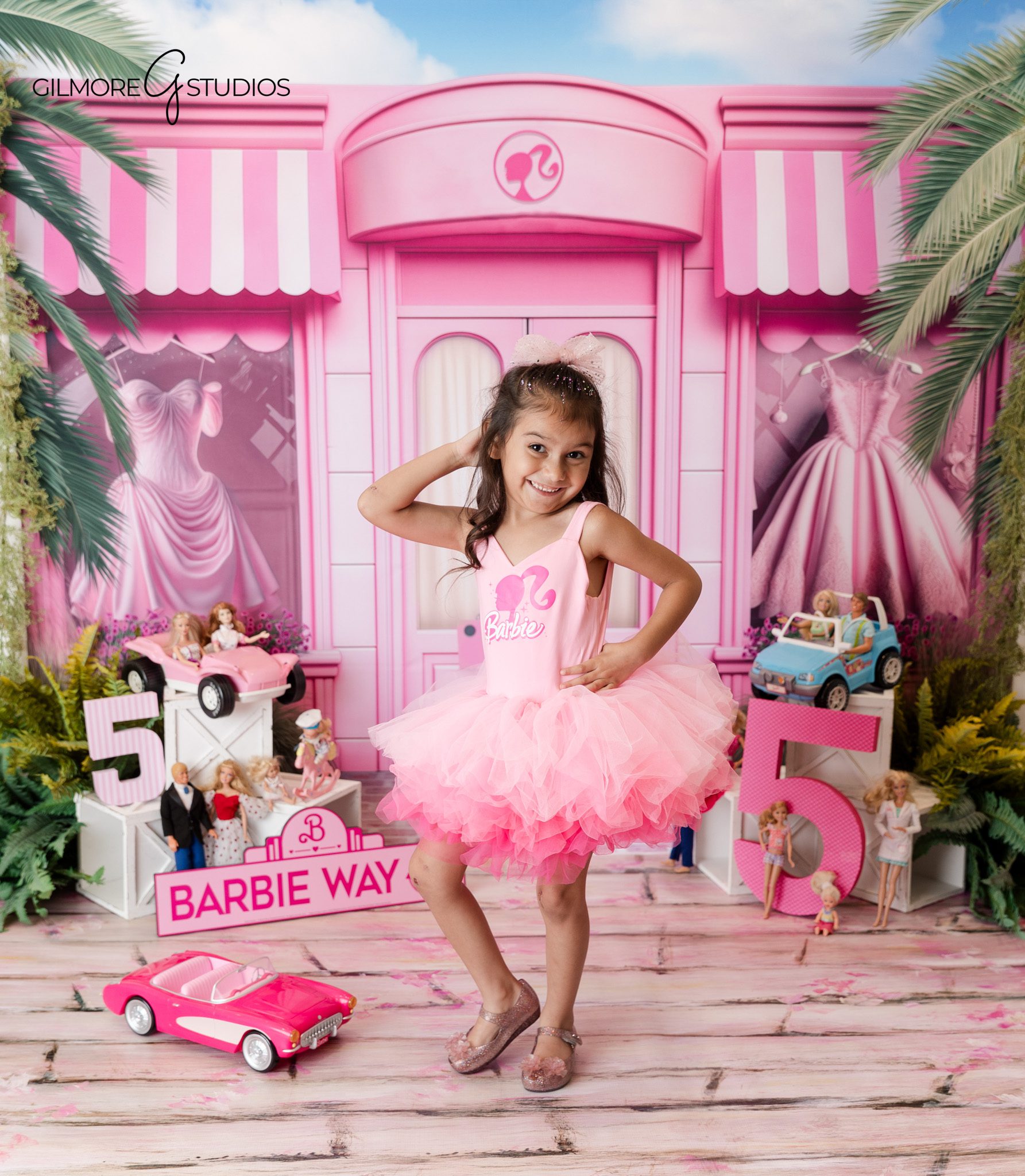5th birthday photography portrait with fashion inspired Barbie look

Girls birthday portrait photography featuring pink Barbie details