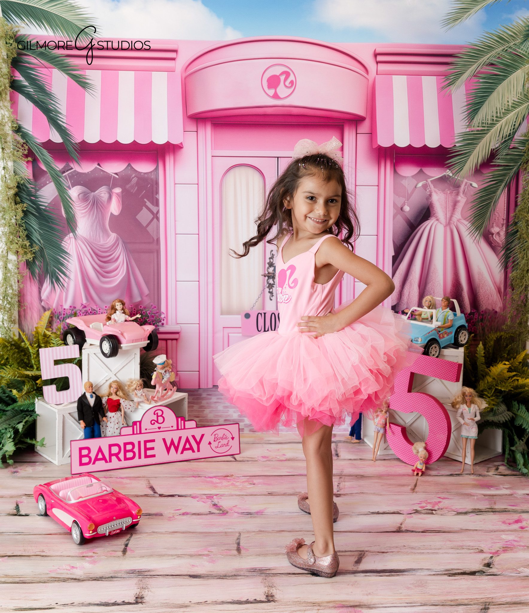 Barbie themed 5th birthday portrait photography session for girls in studio

5th birthday photography portrait with Barbie inspired pink styling