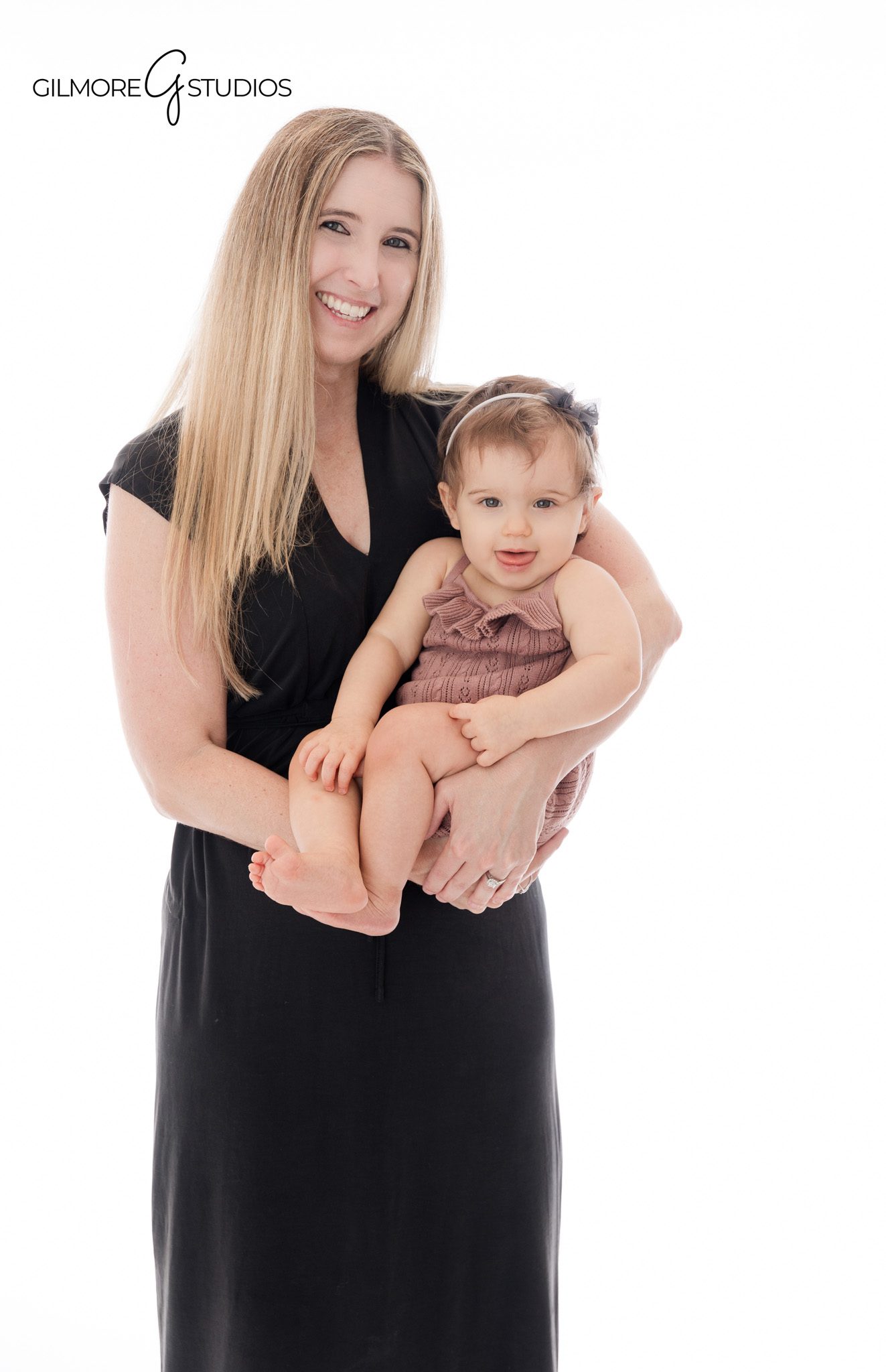 First birthday baby portrait Phoenix AZ floral cake smash setup
Professional baby photography Phoenix AZ floral themed cake smash