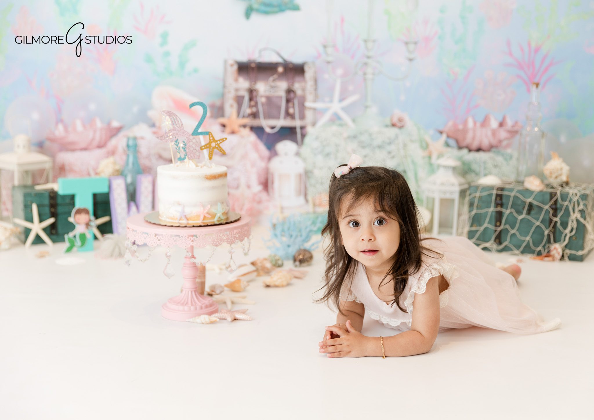 Little Mermaid cake smash portrait by Phoenix AZ cake smash photographer

First birthday cake smash photography in Phoenix AZ with Little Mermaid theme