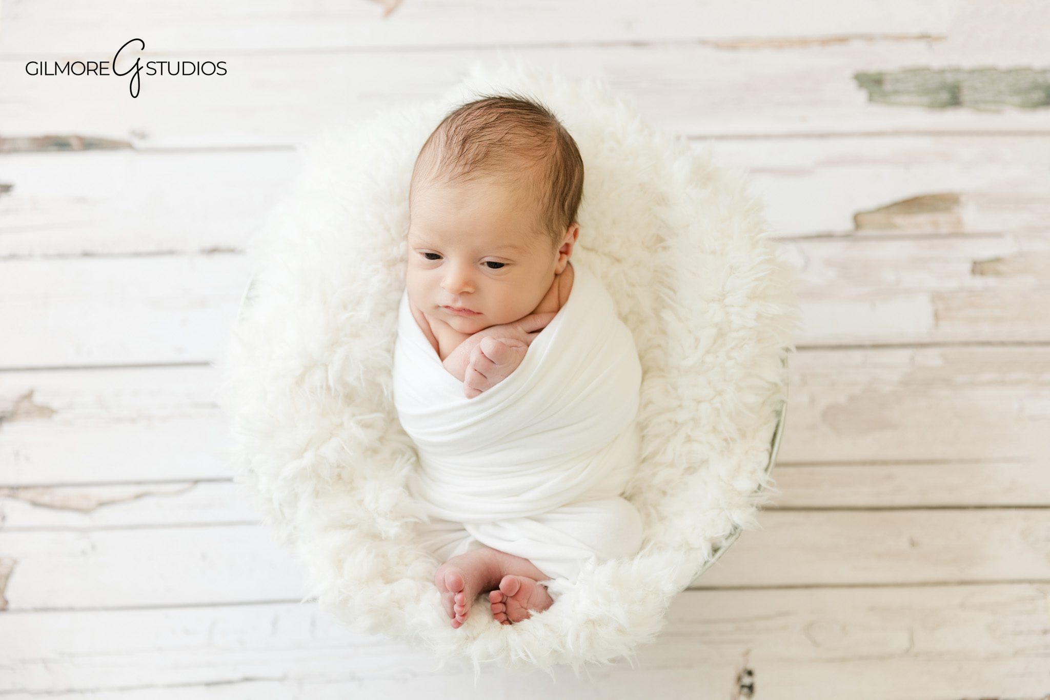Studio newborn photographer Gilbert AZ soft wrapped portrait

Baby portrait photography Gilbert AZ newborn session