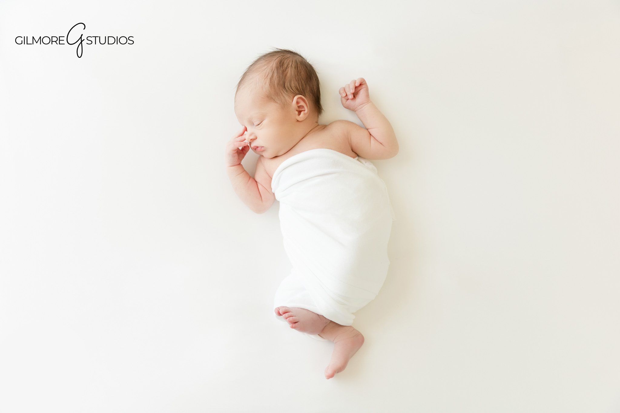 Gilbert newborn photographer swaddled baby portrait session

Studio baby portrait photography Gilbert AZ newborn session