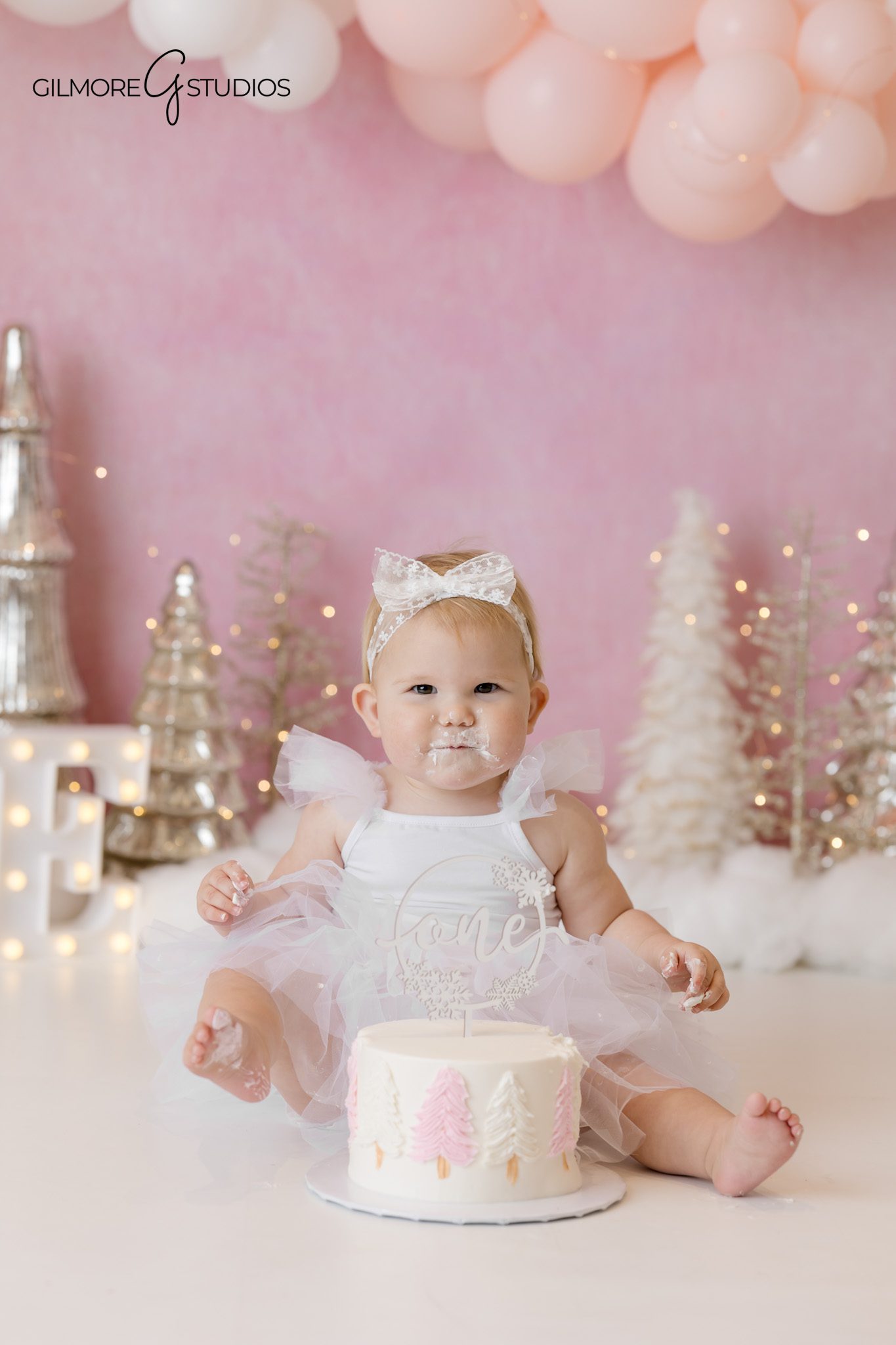 One year old milestone portrait session

Cake smash photography with pastel theme