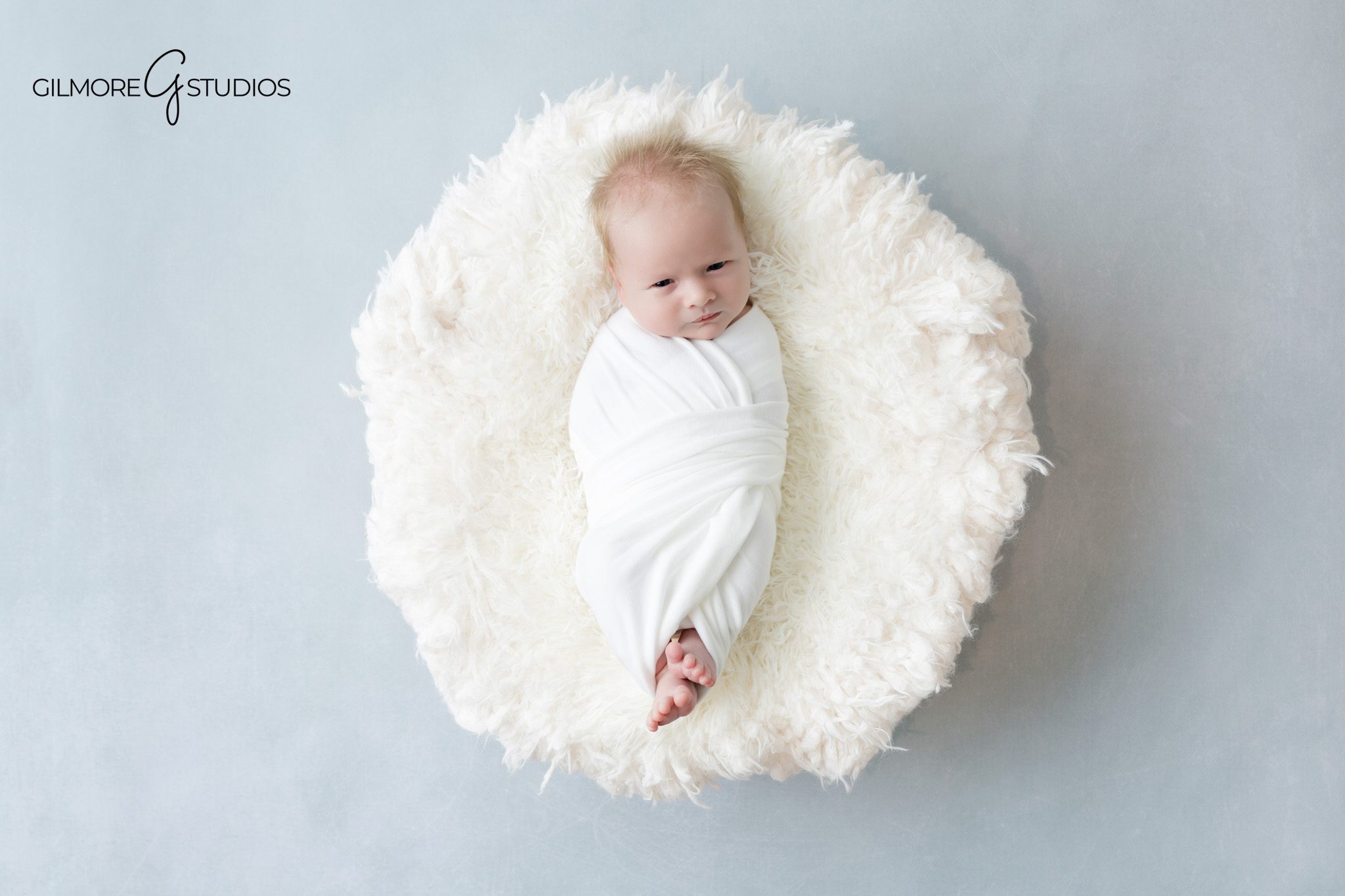 Emotional newborn portrait photography moment

Newborn photography capturing real connection