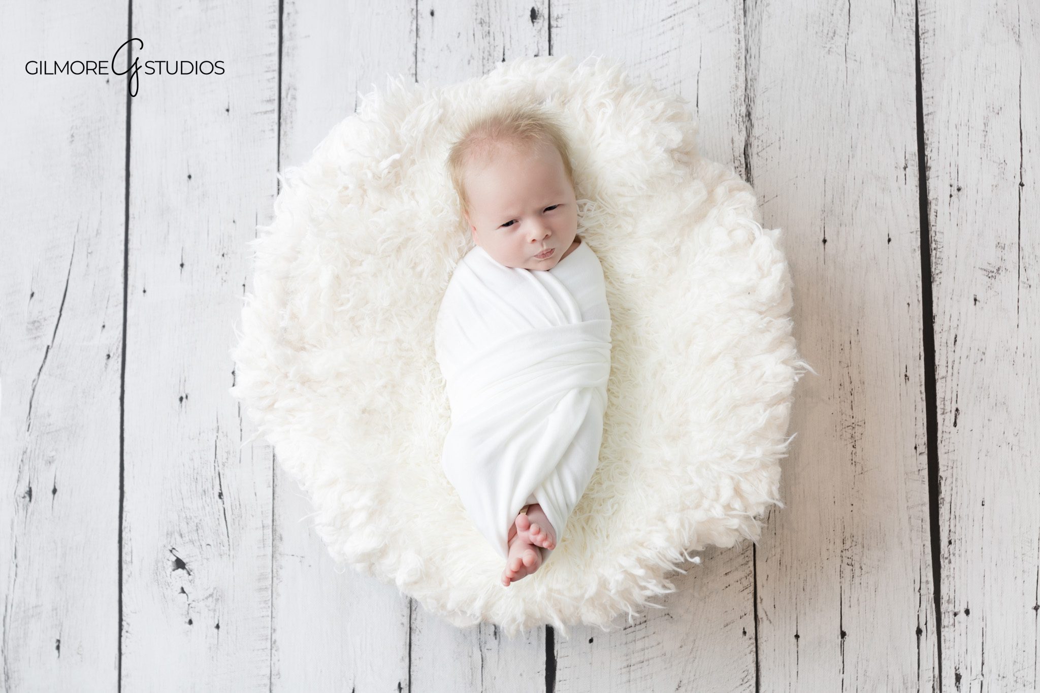 Natural newborn portrait photography moment

Newborn baby photographed in a calm portrait session