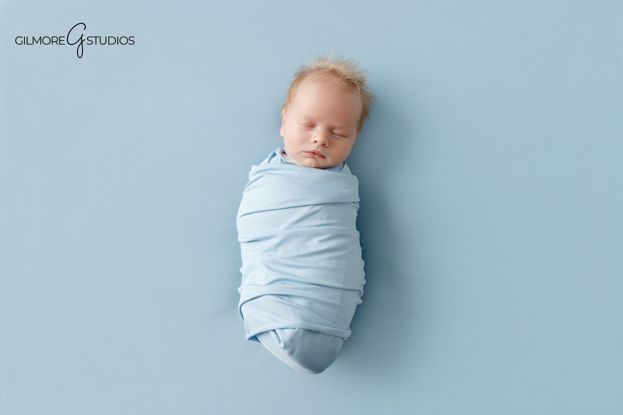 Newborn baby photographed in peaceful portrait

Natural newborn portrait showing connection