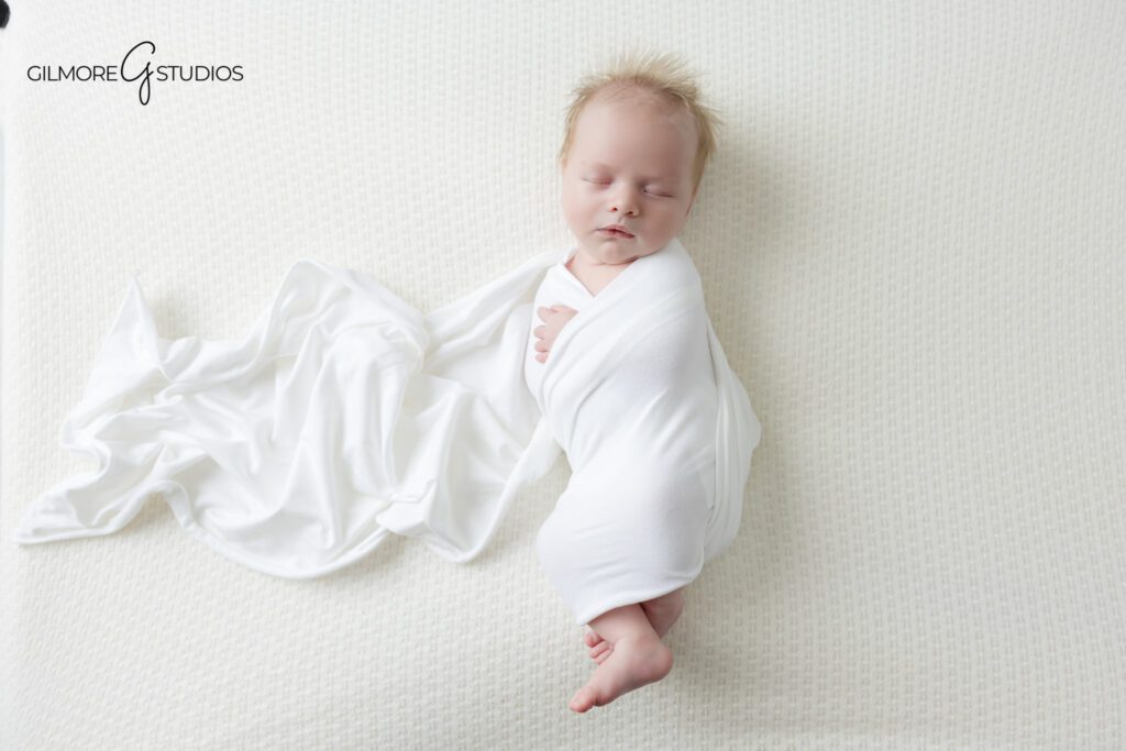 Newborn baby portrait captured during photography session

Calm newborn photography portrait moment