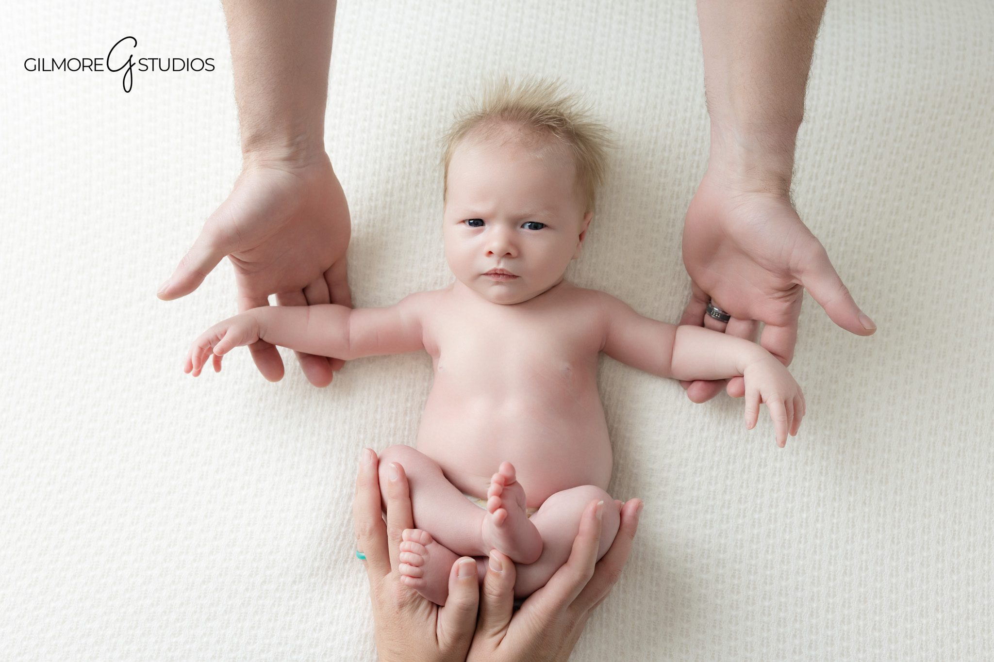 Natural newborn photography portrait moment

Newborn portrait showing warmth and comfort