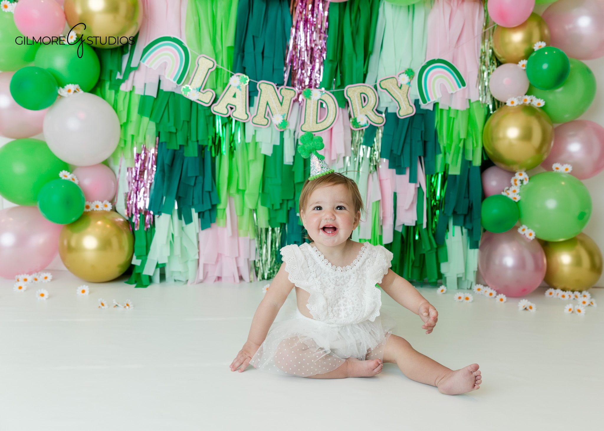 baby photography cake smash session studio milestone portrait
cake smash portrait photography baby sitting with birthday cake