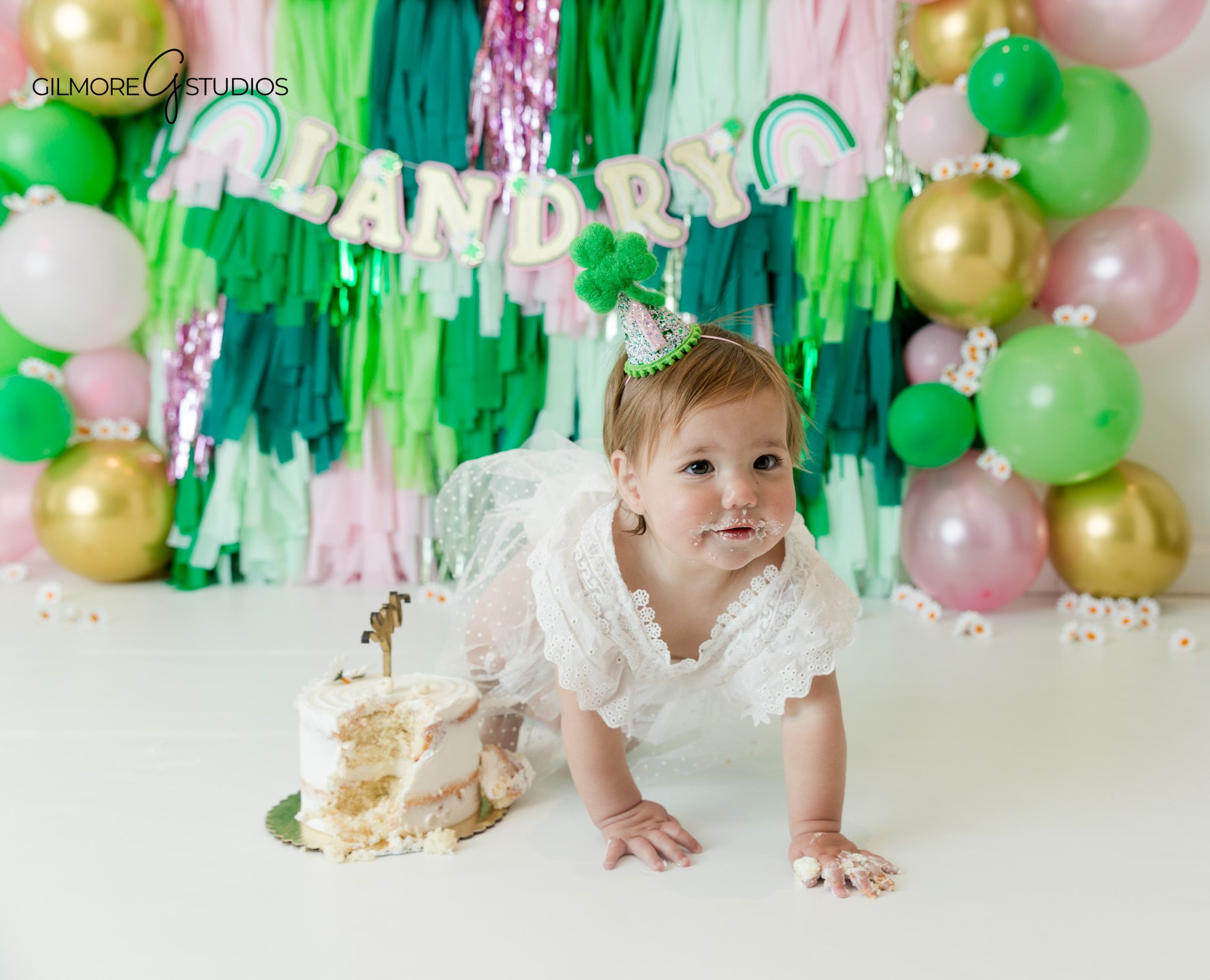 baby girl cake smash photography studio portrait soft colors
cake smash photographer first birthday baby smiling portrait