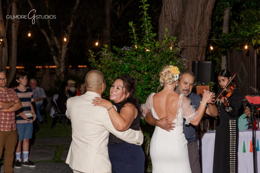 Candid wedding reception moment in Newport Beach ballroom

Wedding guests cheering during reception in Newport Beach