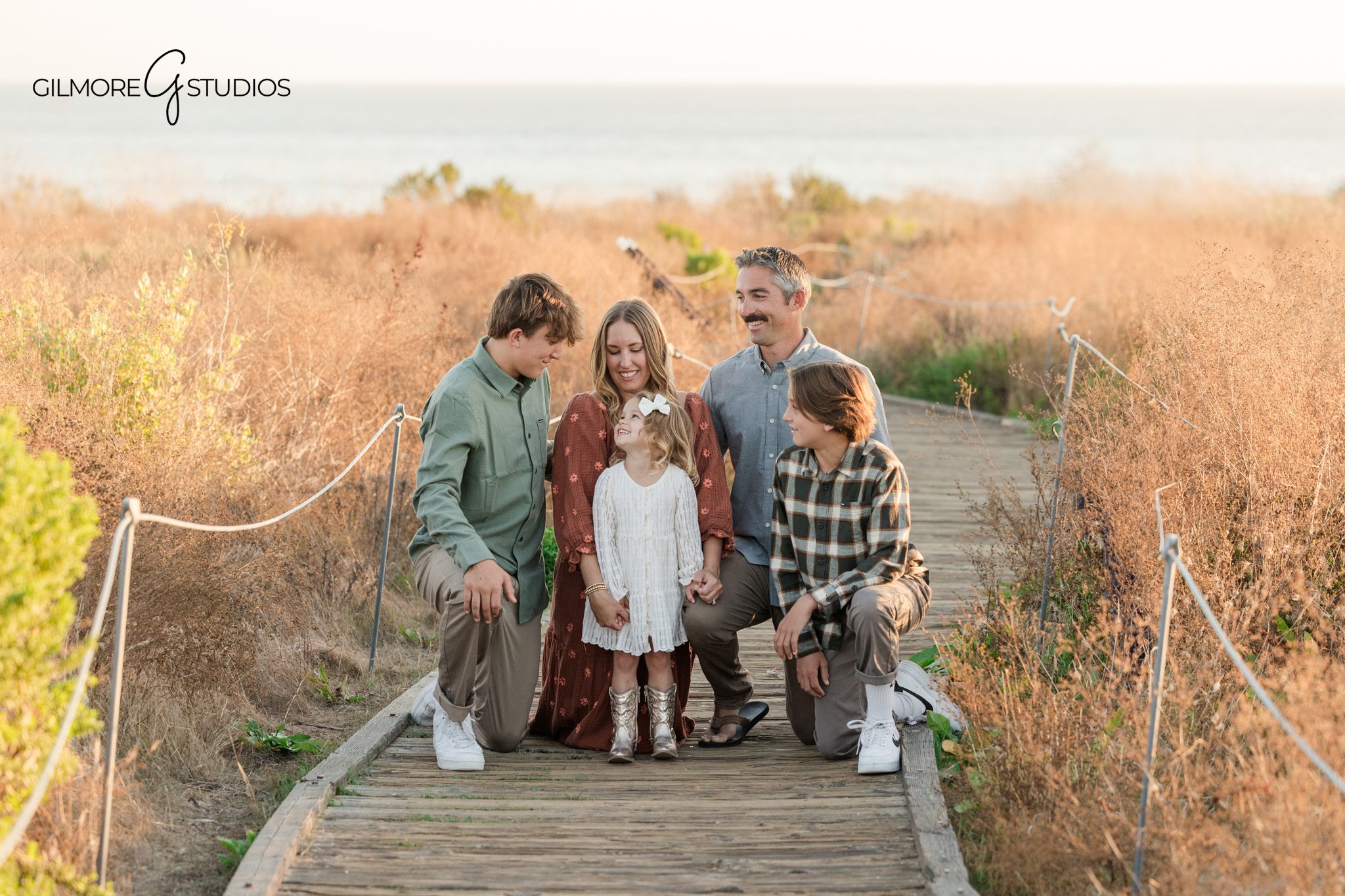 Newport Beach photographer capturing family connection

Family portrait photography with soft coastal tones