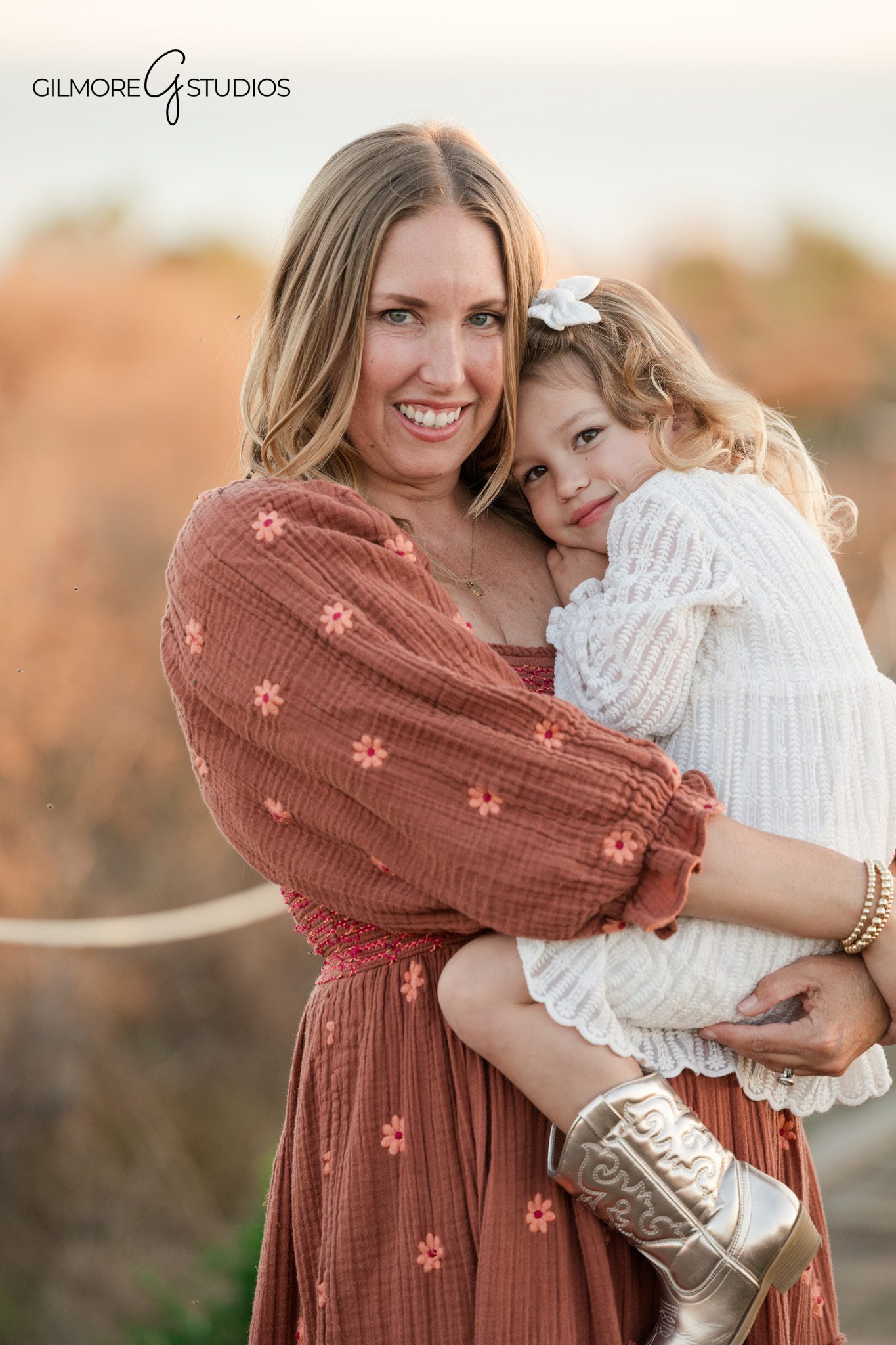 Crystal Cove portrait photographer capturing family interaction

Newport Beach family photography session during golden hour