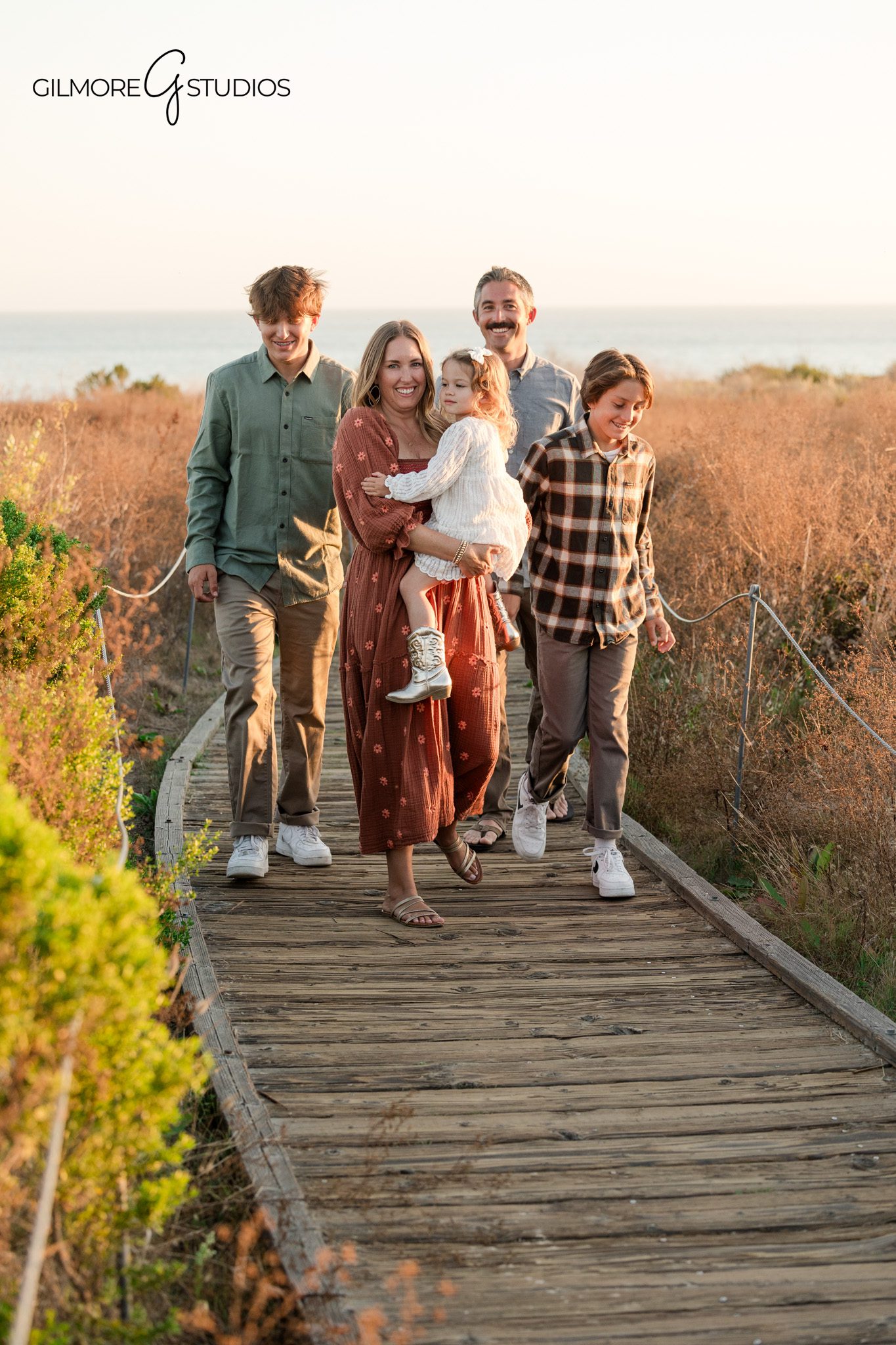 Newport Beach family photographer capturing candid portrait

Family portrait photography session with coastal landscape