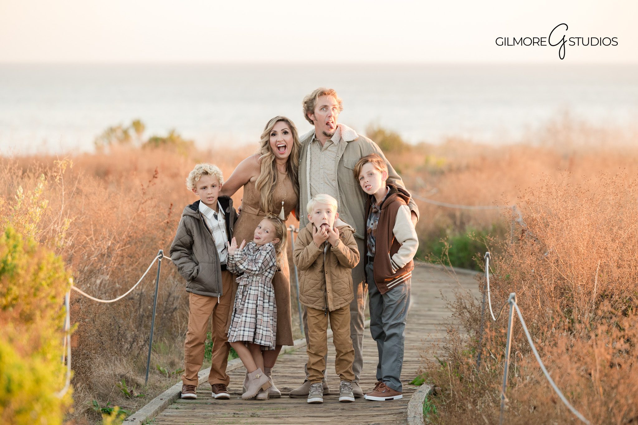 Orange County family photographer Crystal Cove beach portrait
family portrait photography Crystal Cove kids laughing beach session