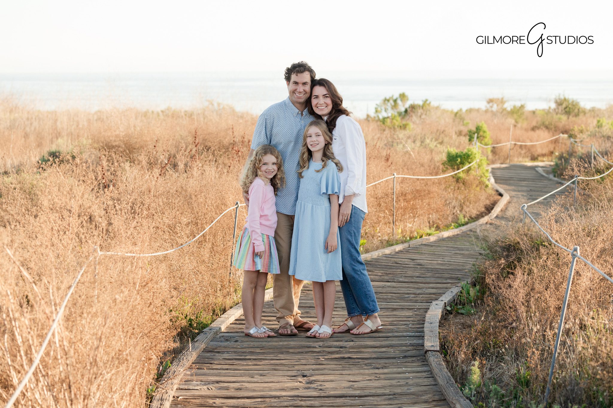 Crystal Cove family photography session with coastal background
Newport Beach family portrait photographed at Crystal Cove