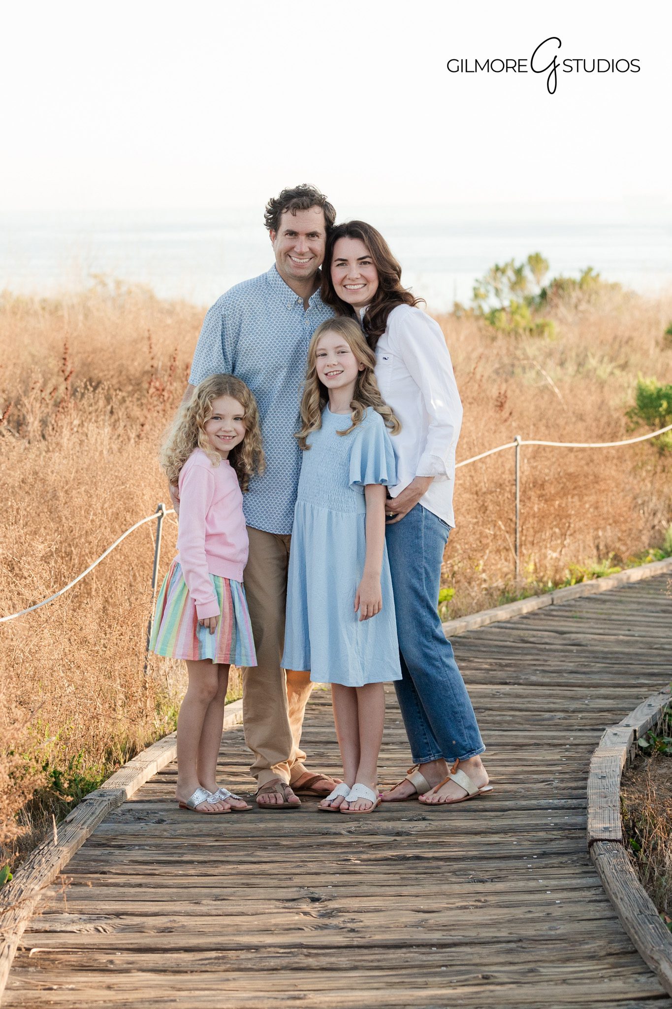 Newport Beach photographer capturing family walking together
Family portrait photography at Crystal Cove State Park