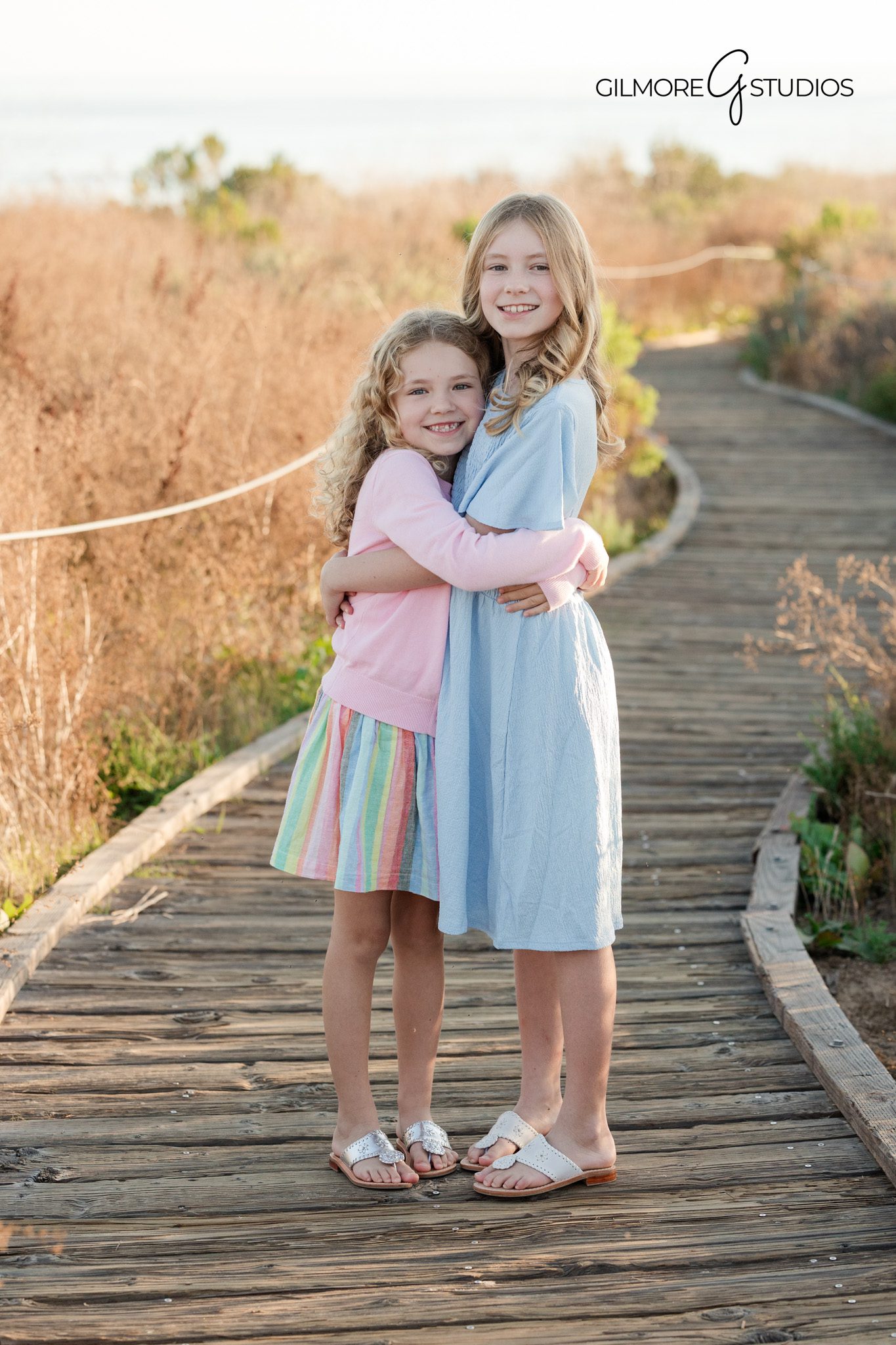 Crystal Cove family photography with soft natural lighting
Newport Beach family portrait with ocean backdrop