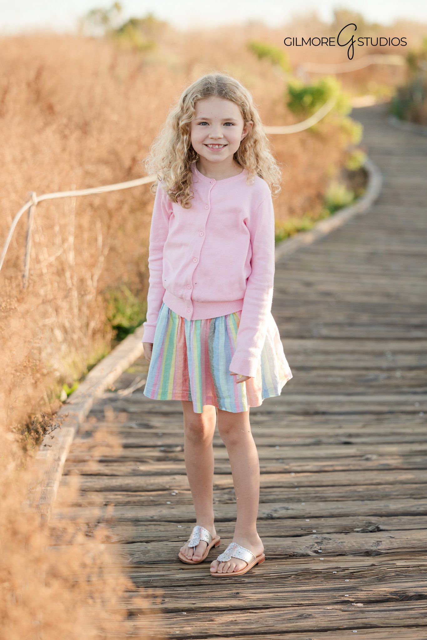 Family photography session near coastal brush landscape
Crystal Cove portrait photography capturing joyful moment