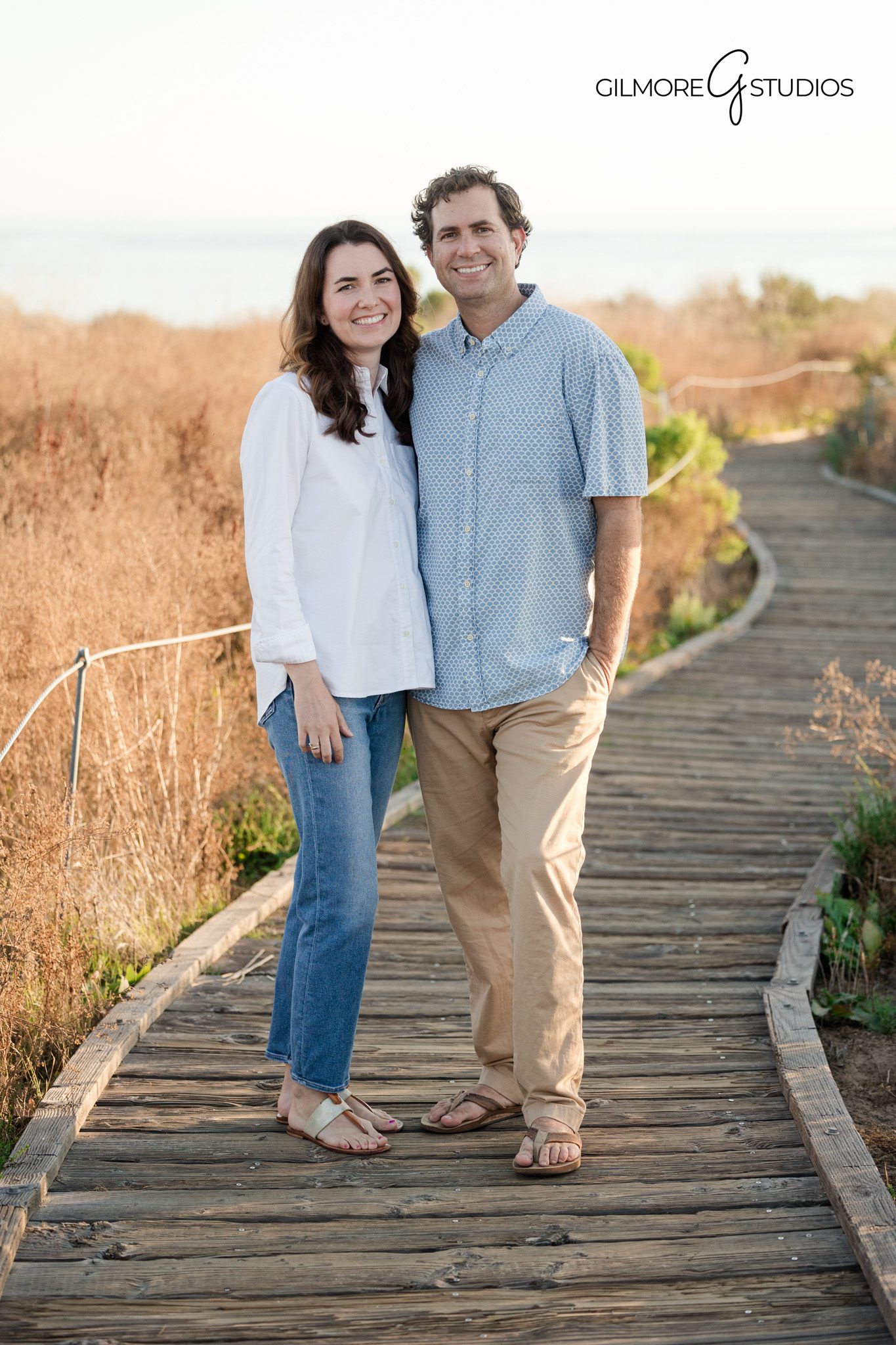 Newport Beach family photographer capturing authentic expression
Family portrait photography session with scenic background