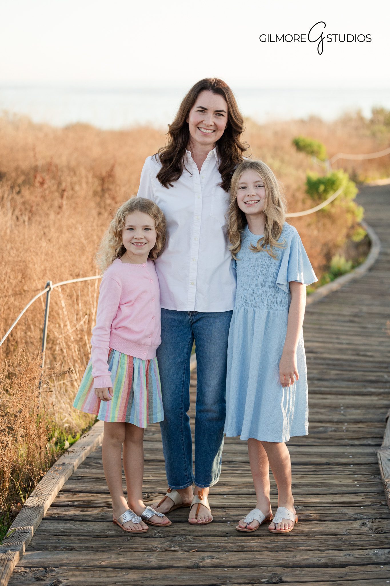 Newport Beach family portrait session near coastal trail
Family photography capturing natural family interaction