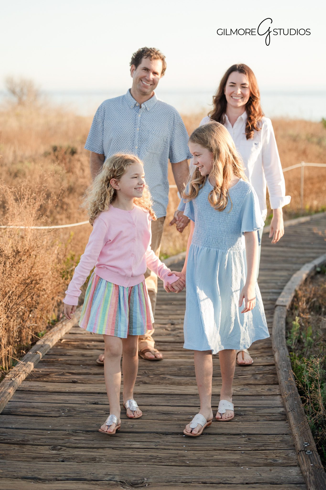 Family photography session showing natural movement
Crystal Cove beach portrait photography with family