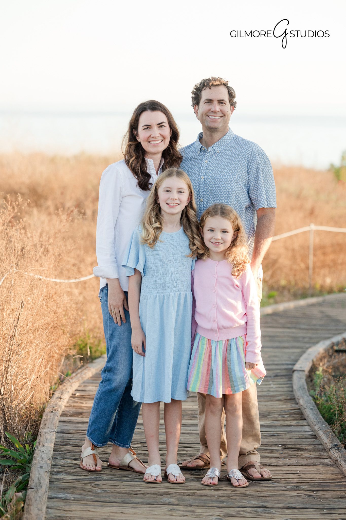 Newport Beach photographer capturing family lifestyle portrait
Family portrait photography with warm coastal tones