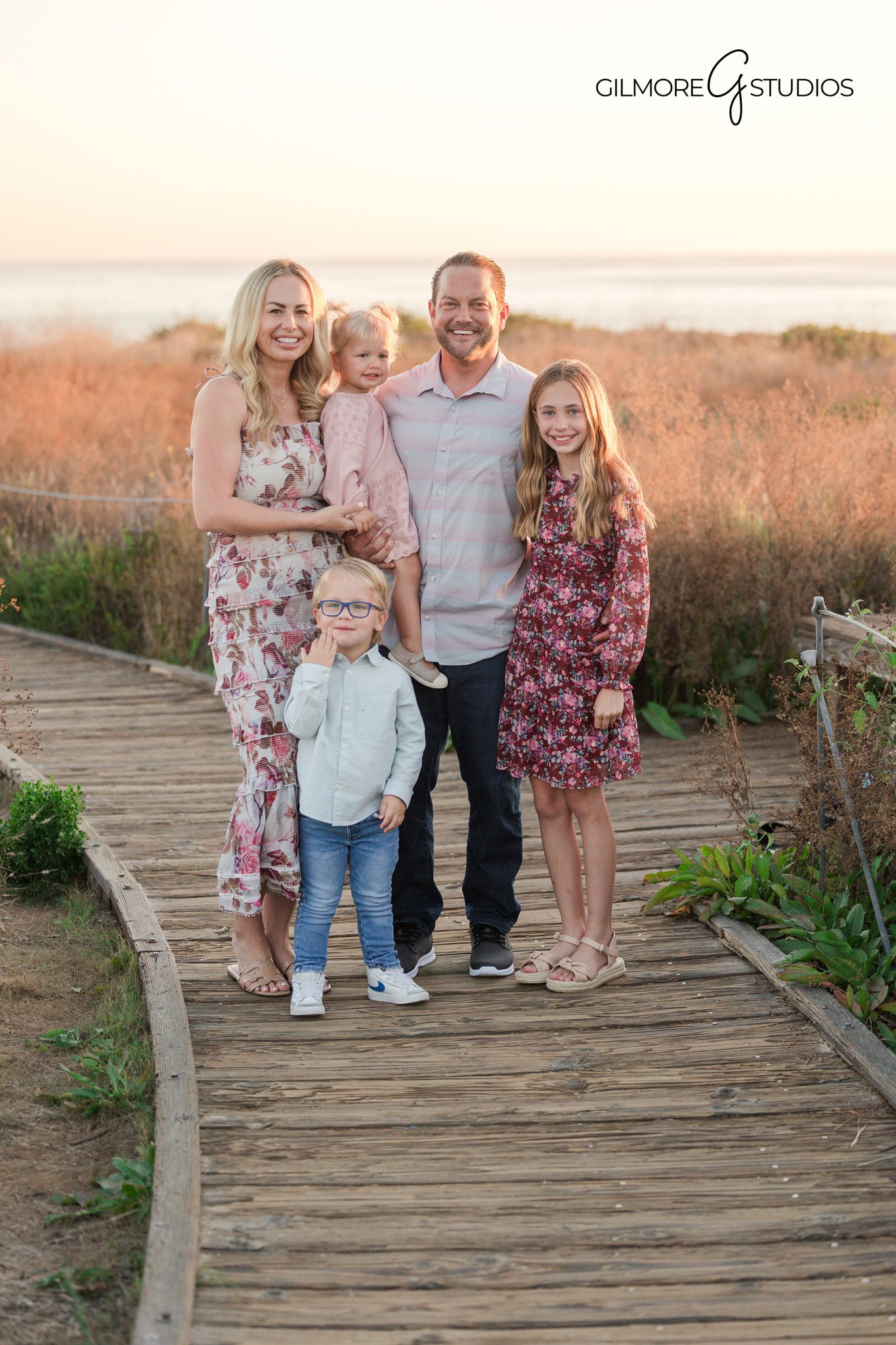 Family portrait photography along coastal walking path

Crystal Cove family photography capturing relaxed expressions
