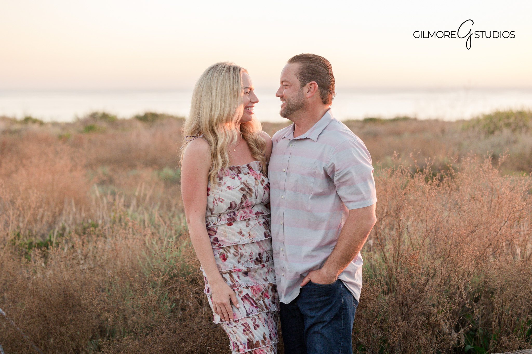 Crystal Cove family photography capturing connection and laughter

Newport Beach family portrait showing relaxed interaction