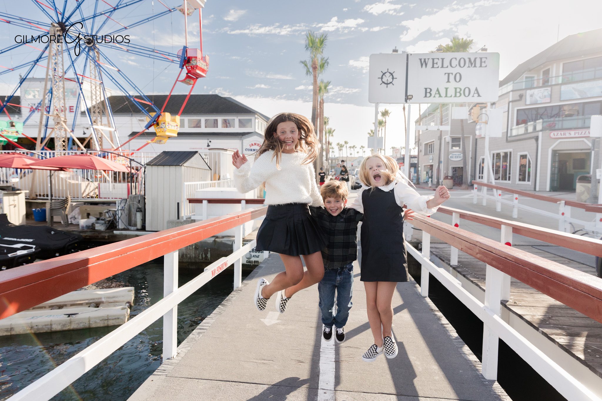 Family portrait photography near Balboa Beach boardwalk

Beach family photography portrait capturing natural expressions