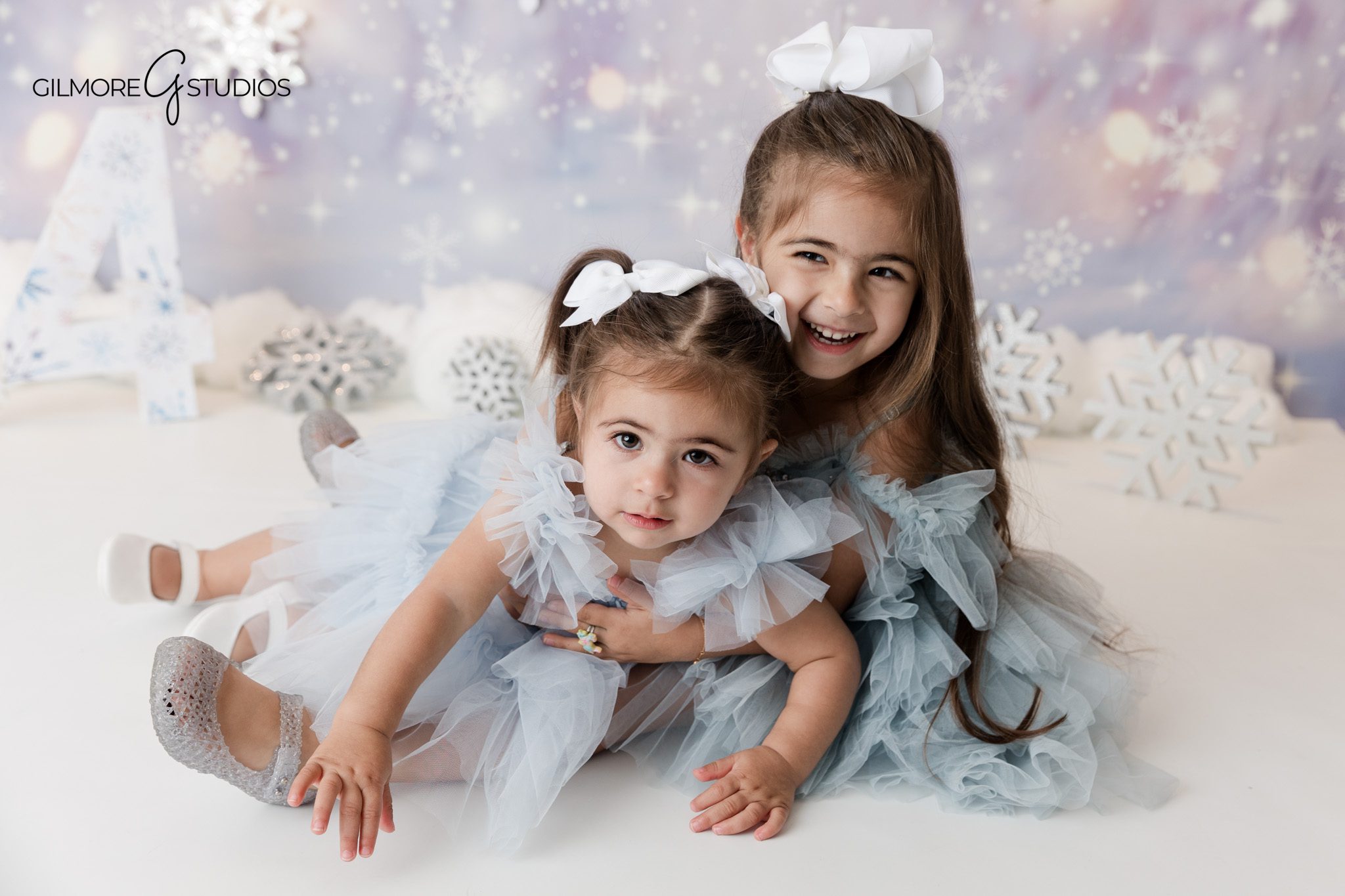 Four year old portrait photography with playful movement

Kids milestone portrait photographed during birthday session