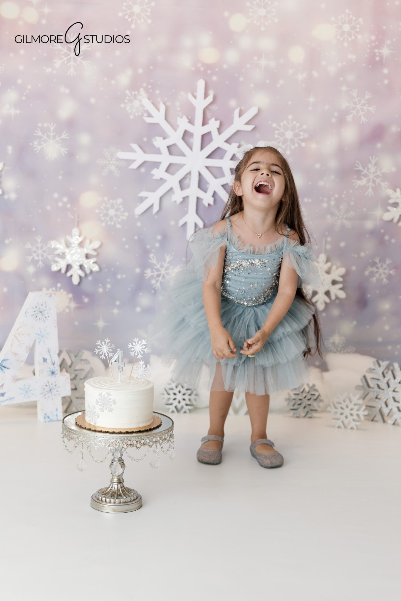 Child portrait photography capturing sibling interaction

Four year old birthday photography portrait session