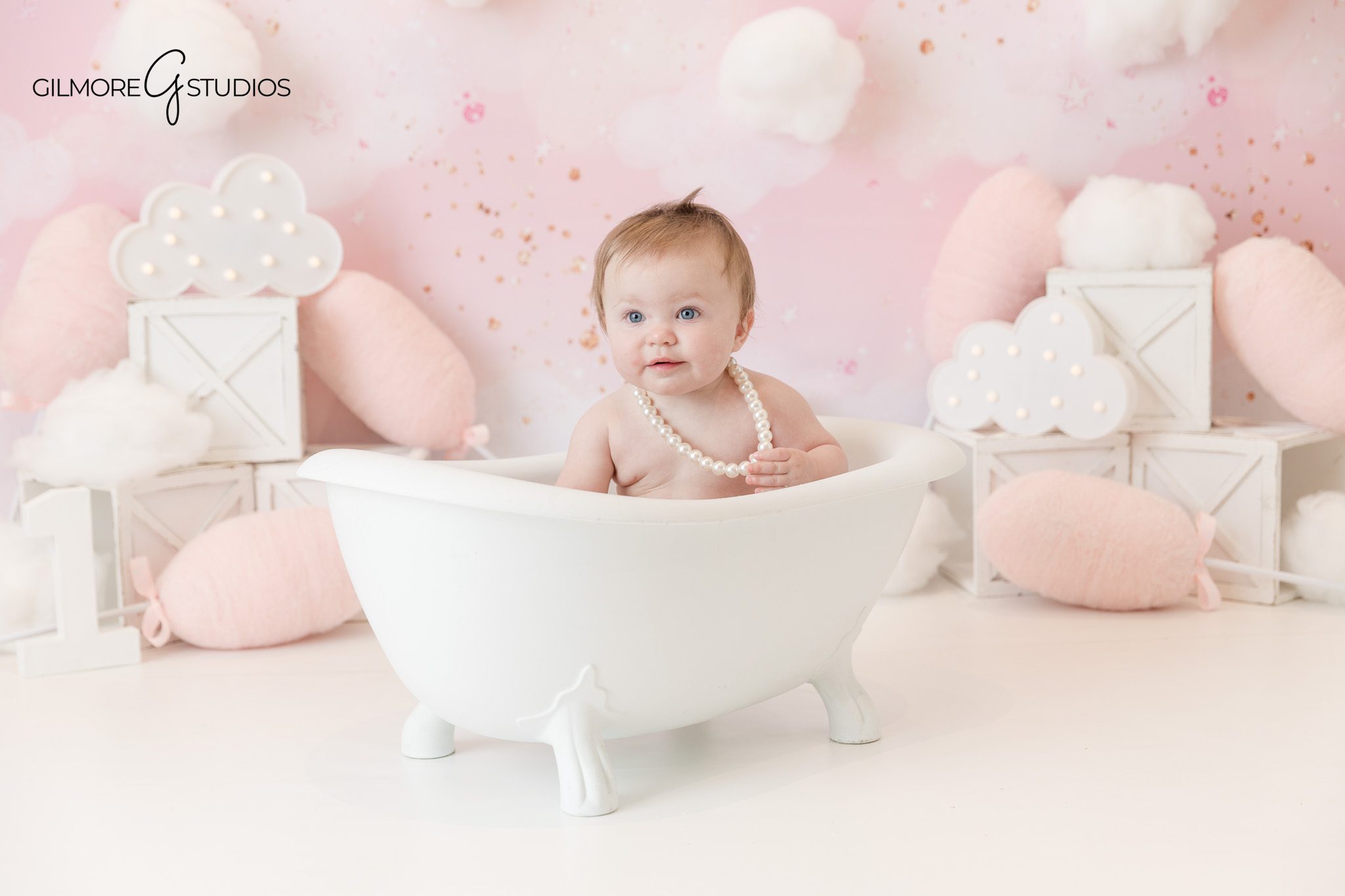 Cake smash portrait photography capturing baby curiosity

Baby portrait photography session celebrating first birthday