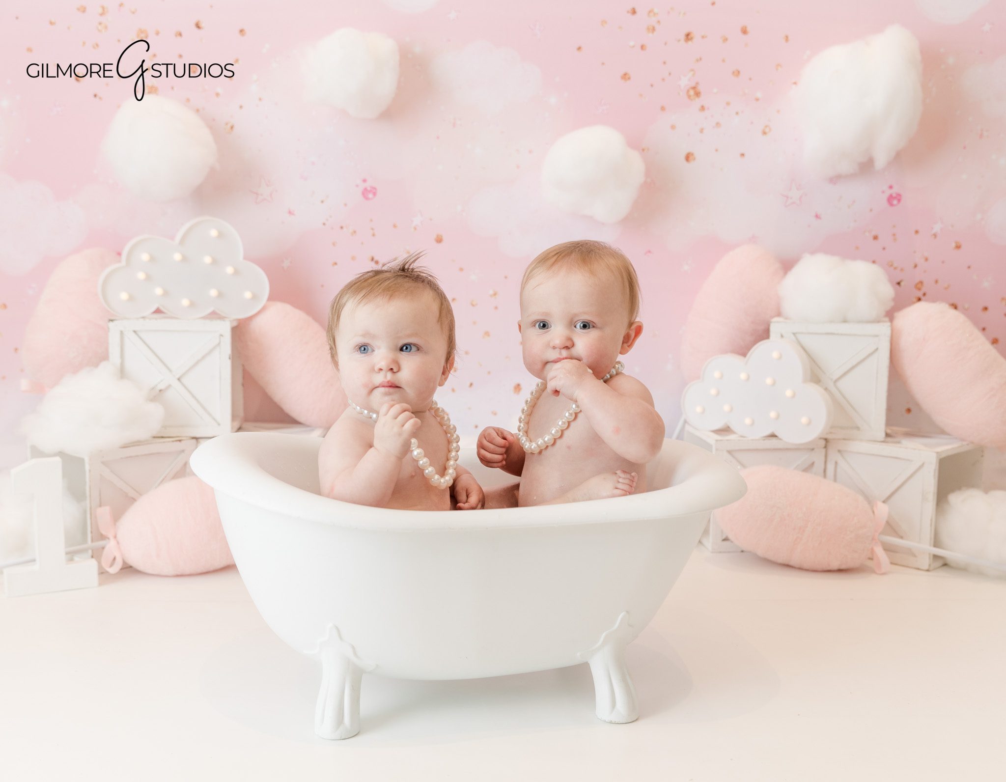 Cake smash photography portrait showing baby interaction

Baby portrait photography with playful birthday theme
